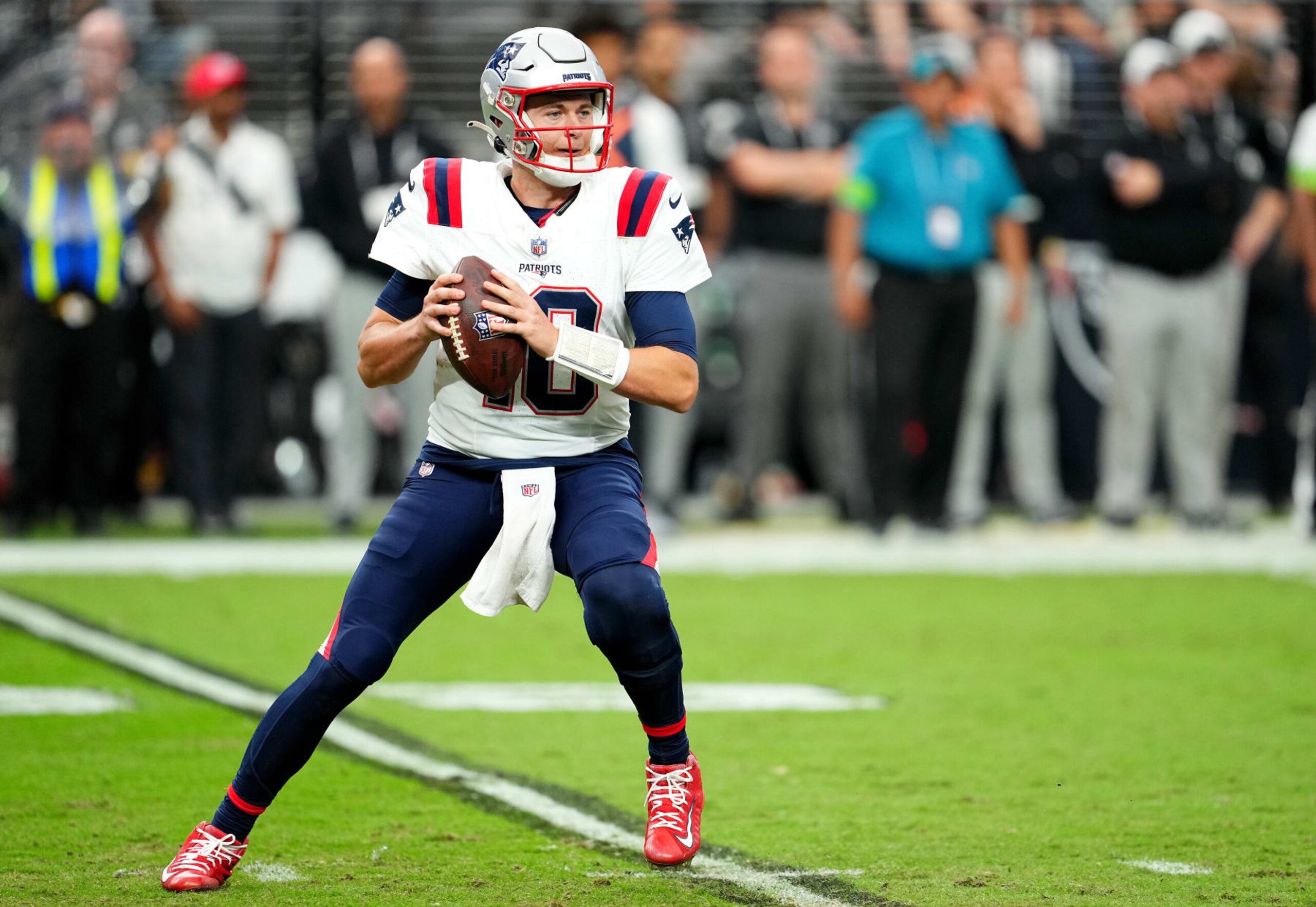 LAS VEGAS, NEVADA - OCTOBER 15: Mac Jones #10 of the New England Patriots attempts a pass during the first half against the Las Vegas Raiders at Allegiant Stadium on October 15, 2023 in Las Vegas, Nevada. (Photo by Chris Unger/Getty Images)