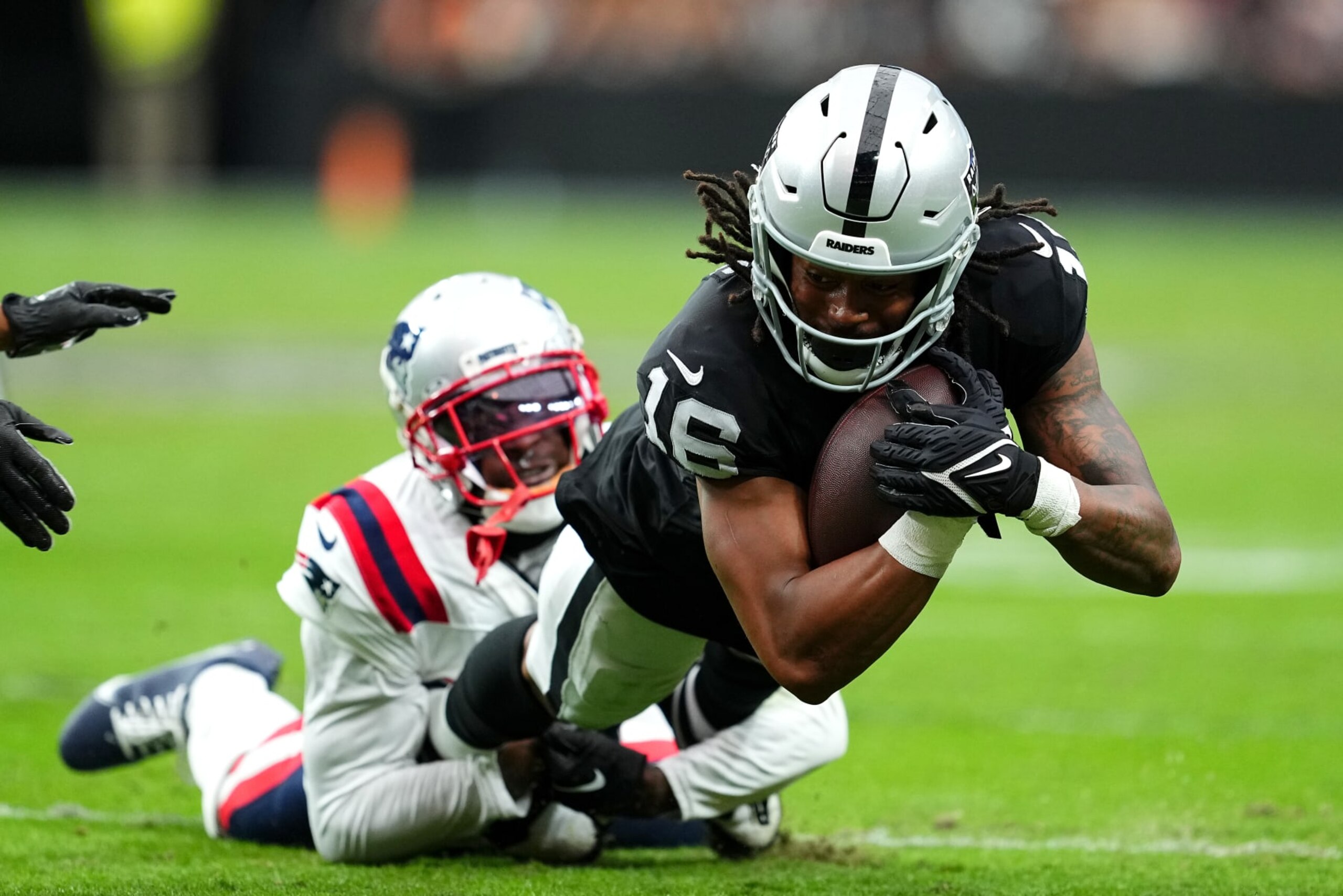 LAS VEGAS, NEVADA - OCTOBER 15: Jakobi Meyers #16 of the Las Vegas Raiders catches a pass during the first half against the New England Patriots at Allegiant Stadium on October 15, 2023 in Las Vegas, Nevada. (Photo by Chris Unger/Getty Images)