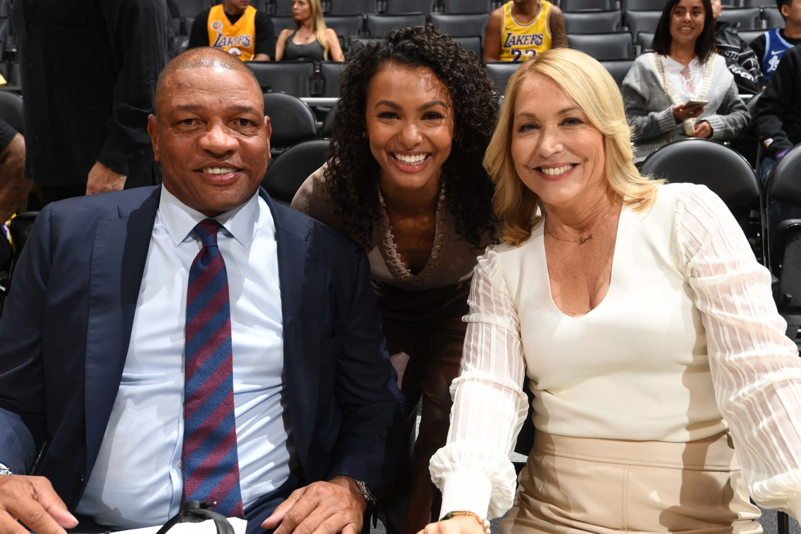 LOS ANGELES, CA - OCTOBER 13: Doc Rivers, Doris Burke, and Malika Andrews talk before the game between the Golden State Warriors and the Los Angeles Lakers on October 13, 2023 at Crypto.Com Arena in Los Angeles, California. NOTE TO USER: User expressly acknowledges and agrees that, by downloading and/or using this Photograph, user is consenting to the terms and conditions of the Getty Images License Agreement. Mandatory Copyright Notice: Copyright 2023 NBAE (Photo by Andrew D. Bernstein/NBAE via Getty Images)