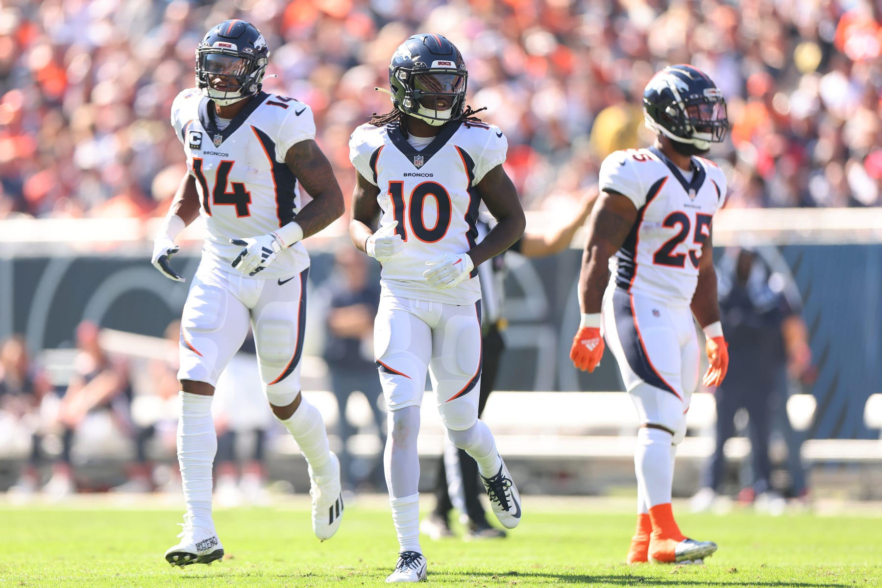 CHICAGO, ILLINOIS - OCTOBER 01: Courtland Sutton #14 and Jerry Jeudy #10 of the Denver Broncos look on against the Chicago Bears at Soldier Field on October 01, 2023 in Chicago, Illinois. (Photo by Michael Reaves/Getty Images)