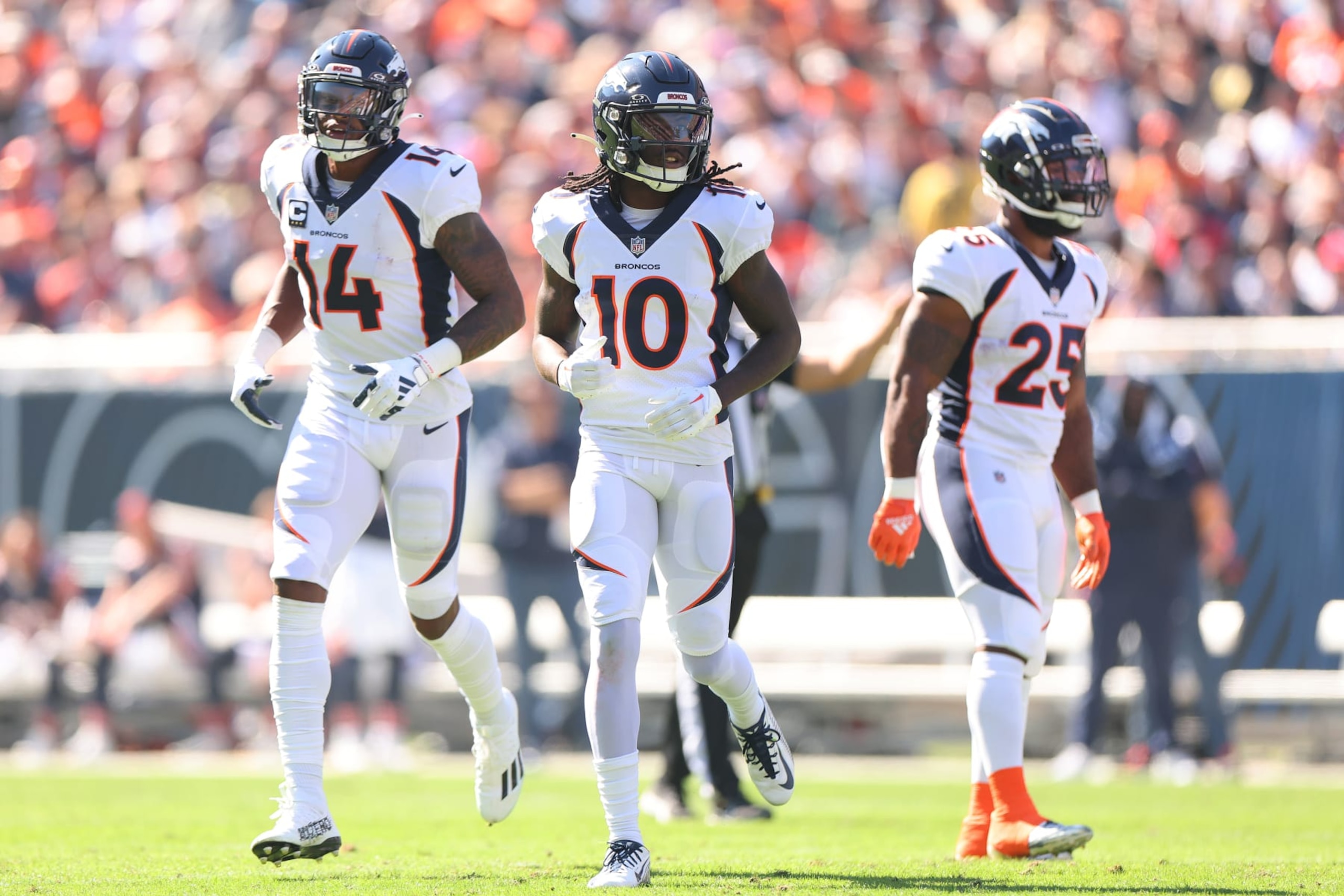 CHICAGO, ILLINOIS - OCTOBER 01: Courtland Sutton #14 and Jerry Jeudy #10 of the Denver Broncos look on against the Chicago Bears at Soldier Field on October 01, 2023 in Chicago, Illinois. (Photo by Michael Reaves/Getty Images) CHICAGO, ILLINOIS - OCTOBER 01: Courtland Sutton #14 and Jerry Jeudy #10 of the Denver Broncos look on against the Chicago Bears at Soldier Field on October 01, 2023 in Chicago, Illinois. (Photo by Michael Reaves/Getty Images)