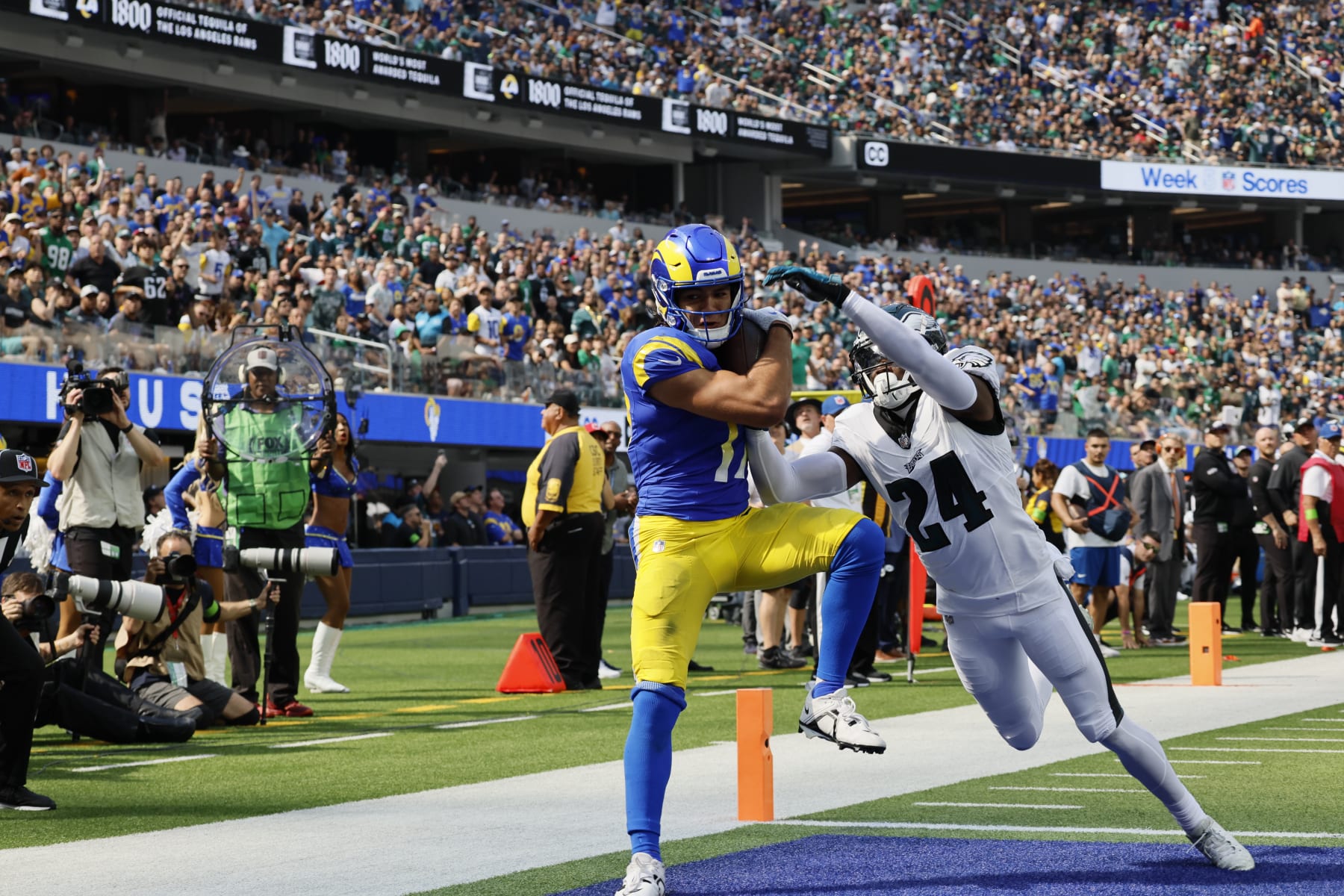 Inglewood, CA - October 08: Los Angeles Rams wide receiver Puka Nacua catches a second quarter touchdown past Philadelphia Eagles cornerback James Bradberry at SoFi Stadium on Sunday, Oct. 8, 2023, in Inglewood, CA. (Allen J. Schaben / Los Angeles Times via Getty Images)