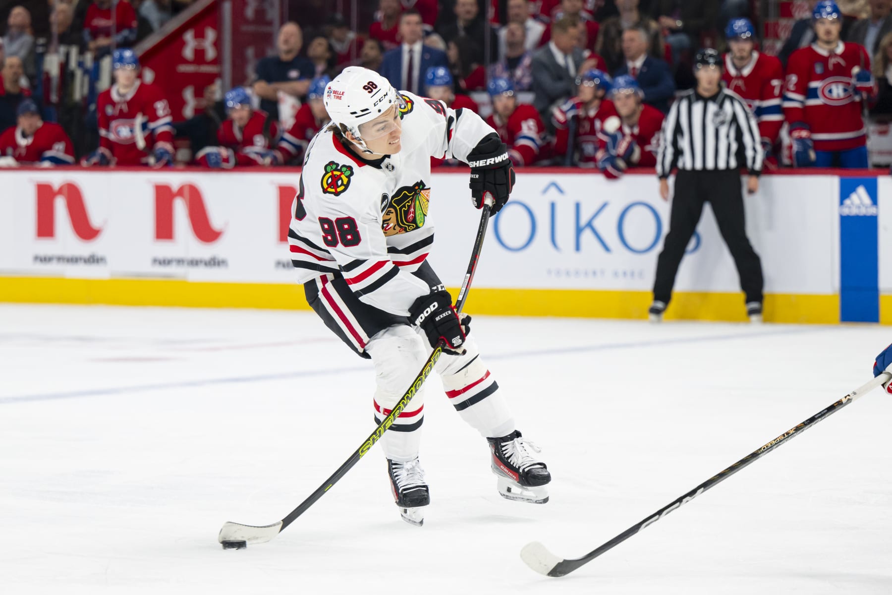 MONTREAL, CANADA - OCTOBER 14: Connor Bedard #98 of the Chicago Blackhawks takes a shot on goal during the first period of the NHL regular season game between the Montreal Canadiens and the Chicago Blackhawks at the Bell Centre on October 14, 2023 in Montreal, Quebec, Canada. (Photo by Matt Garies/NHLI via Getty Images) MONTREAL, CANADA - OCTOBER 14: Connor Bedard #98 of the Chicago Blackhawks takes a shot on goal during the first period of the NHL regular season game between the Montreal Canadiens and the Chicago Blackhawks at the Bell Centre on October 14, 2023 in Montreal, Quebec, Canada. (Photo by Matt Garies/NHLI via Getty Images)