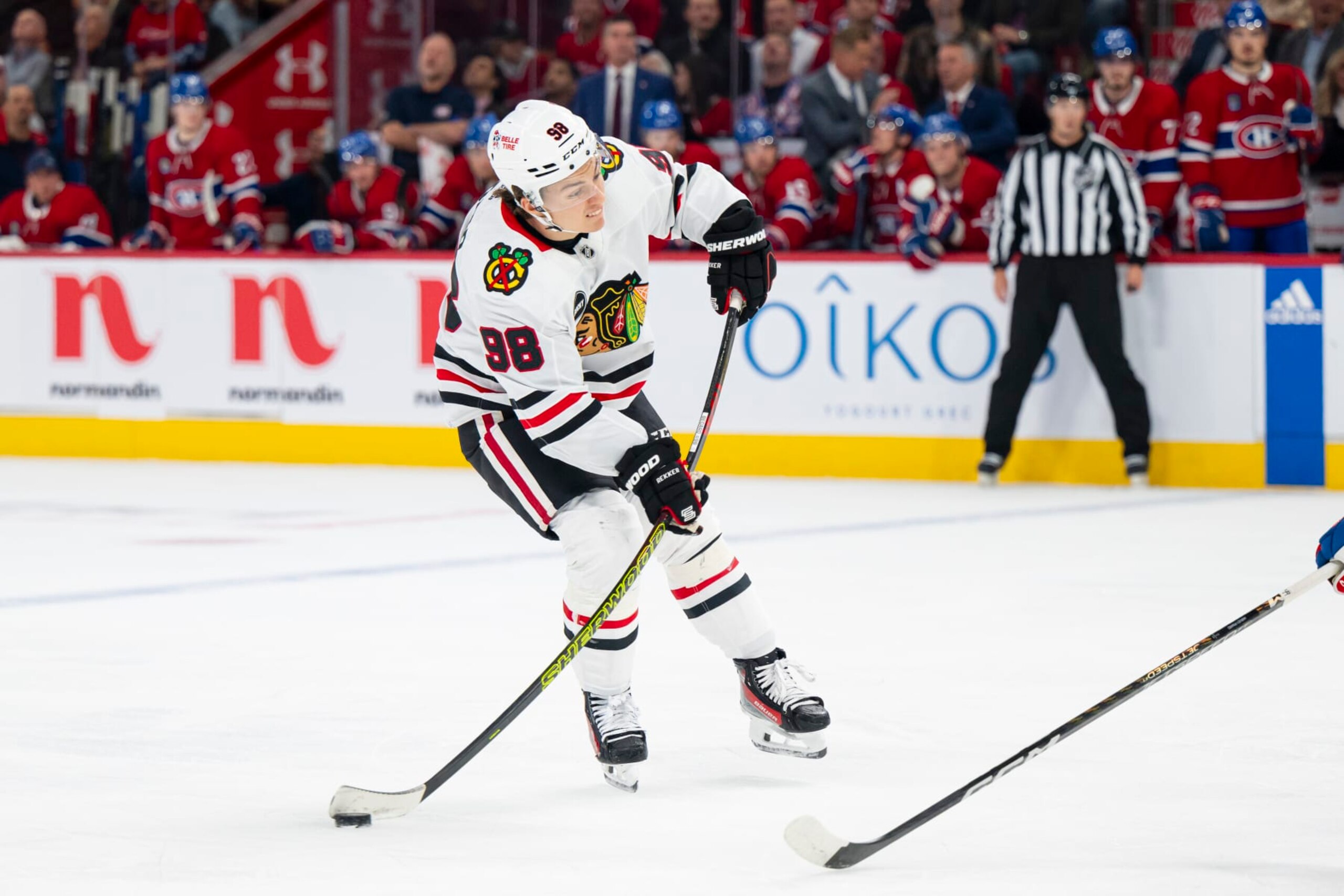 MONTREAL, CANADA - OCTOBER 14: Connor Bedard #98 of the Chicago Blackhawks takes a shot on goal during the first period of the NHL regular season game between the Montreal Canadiens and the Chicago Blackhawks at the Bell Centre on October 14, 2023 in Montreal, Quebec, Canada. (Photo by Matt Garies/NHLI via Getty Images)