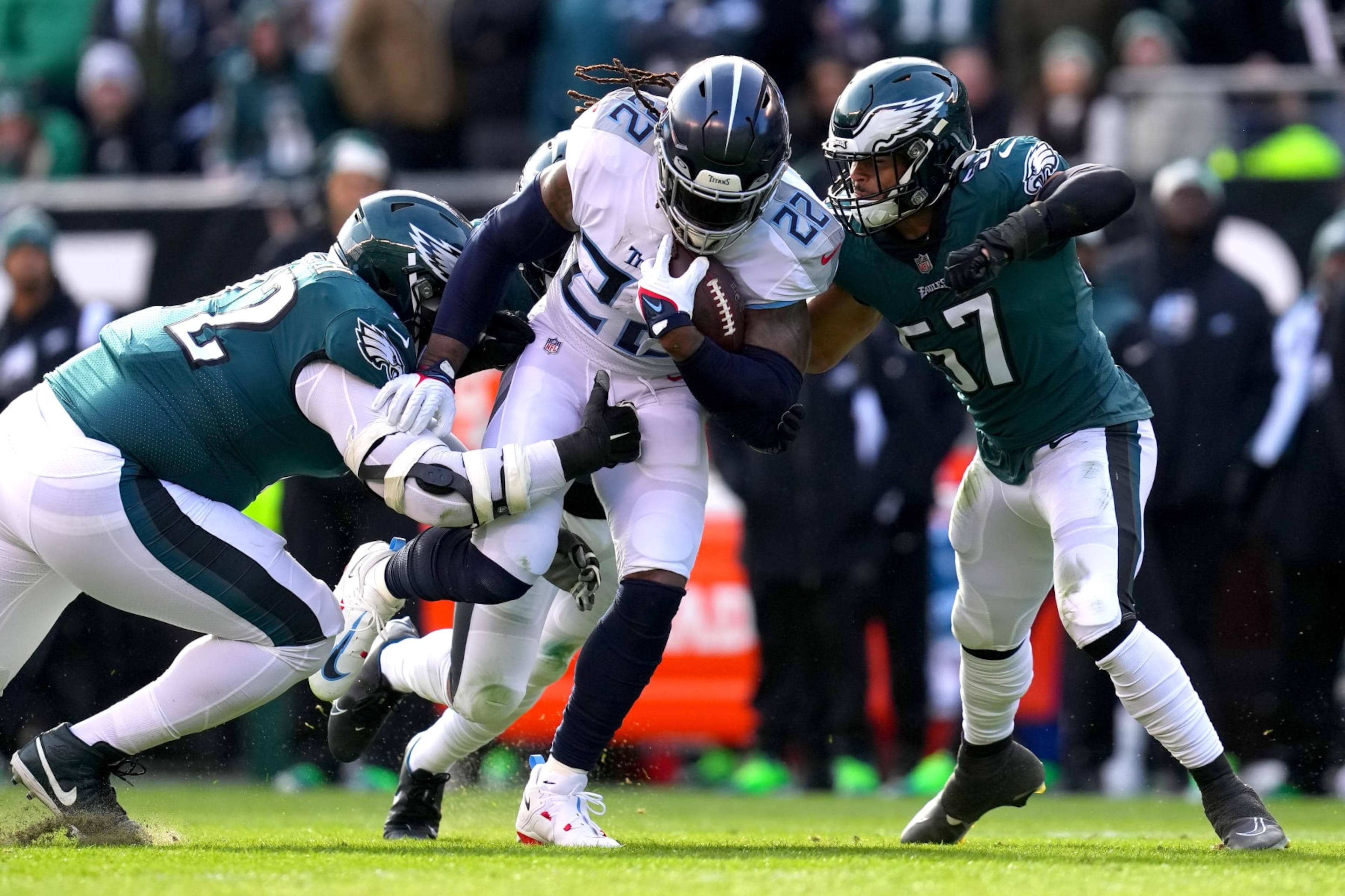 PHILADELPHIA, PENNSYLVANIA - DECEMBER 04: Derrick Henry #22 of the Tennessee Titans carries the ball against the Philadelphia Eagles during the first half of the game at Lincoln Financial Field on December 04, 2022 in Philadelphia, Pennsylvania. (Photo by Mitchell Leff/Getty Images) PHILADELPHIA, PENNSYLVANIA - DECEMBER 04: Derrick Henry #22 of the Tennessee Titans carries the ball against the Philadelphia Eagles during the first half of the game at Lincoln Financial Field on December 04, 2022 in Philadelphia, Pennsylvania. (Photo by Mitchell Leff/Getty Images)