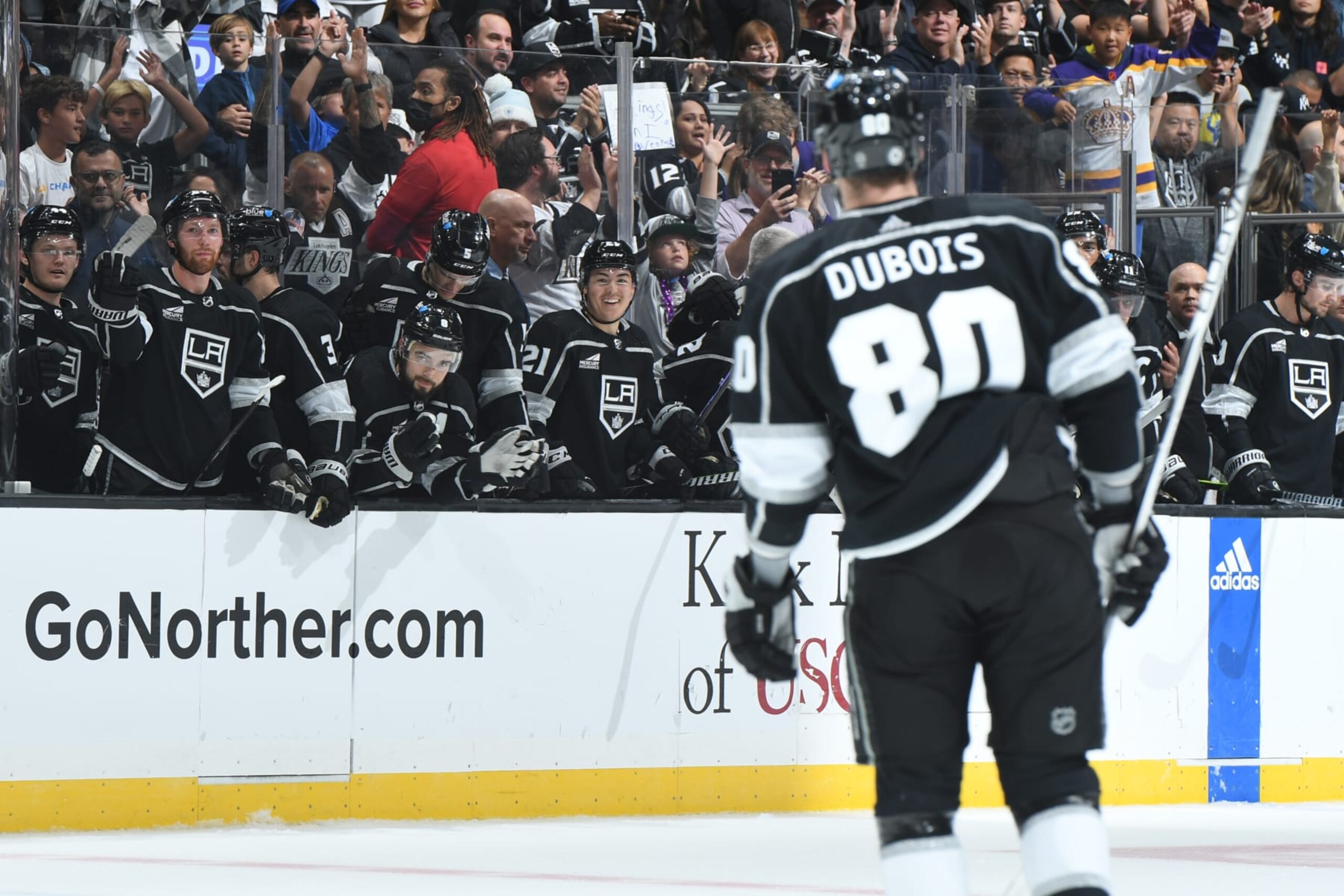 LOS ANGELES, CA - October 14: Pierre-Luc Dubois #80 of the Los Angeles Kings celebrates goal with teammates during shoot out against the Carolina Hurricanes at Crypto.com Arena on October 14, 2023 in Los Angeles, California. (Photo by Andrew D. Bernstein/NHLI via Getty Images)