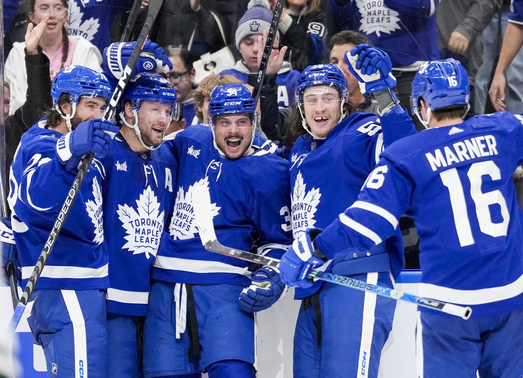 TORONTO, ON - OCTOBER 14: Auston Matthews #34 of the Toronto Maple Leafs celebrates his third goal of the game against the Minnesota Wild with teammates TJ Brodie #78, Morgan Rielly #44, Tyler Bertuzzi #59 and Mitchell Marner #16 during the third period at the Scotiabank Arena on October 14, 2023 in Toronto, Ontario, Canada. (Photo by Andrew Lahodynskyj/NHLI via Getty Images) TORONTO, ON - OCTOBER 14: Auston Matthews #34 of the Toronto Maple Leafs celebrates his third goal of the game against the Minnesota Wild with teammates TJ Brodie #78, Morgan Rielly #44, Tyler Bertuzzi #59 and Mitchell Marner #16 during the third period at the Scotiabank Arena on October 14, 2023 in Toronto, Ontario, Canada. (Photo by Andrew Lahodynskyj/NHLI via Getty Images)