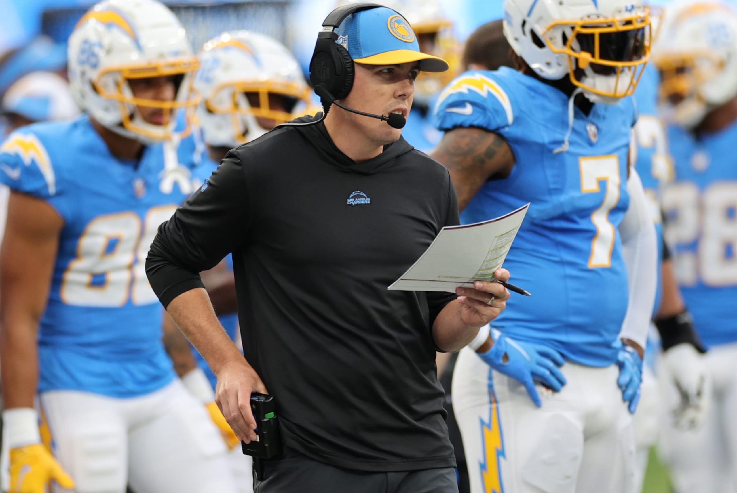 INGLEWOOD, CALIFORNIA - OCTOBER 01: Offensive coordinator Kellen Moore of the Los Angeles Chargers looks on against the Las Vegas Raiders during the first half at SoFi Stadium on October 01, 2023 in Inglewood, California. (Photo by Kevork Djansezian/Getty Images) INGLEWOOD, CALIFORNIA - OCTOBER 01: Offensive coordinator Kellen Moore of the Los Angeles Chargers looks on against the Las Vegas Raiders during the first half at SoFi Stadium on October 01, 2023 in Inglewood, California. (Photo by Kevork Djansezian/Getty Images)