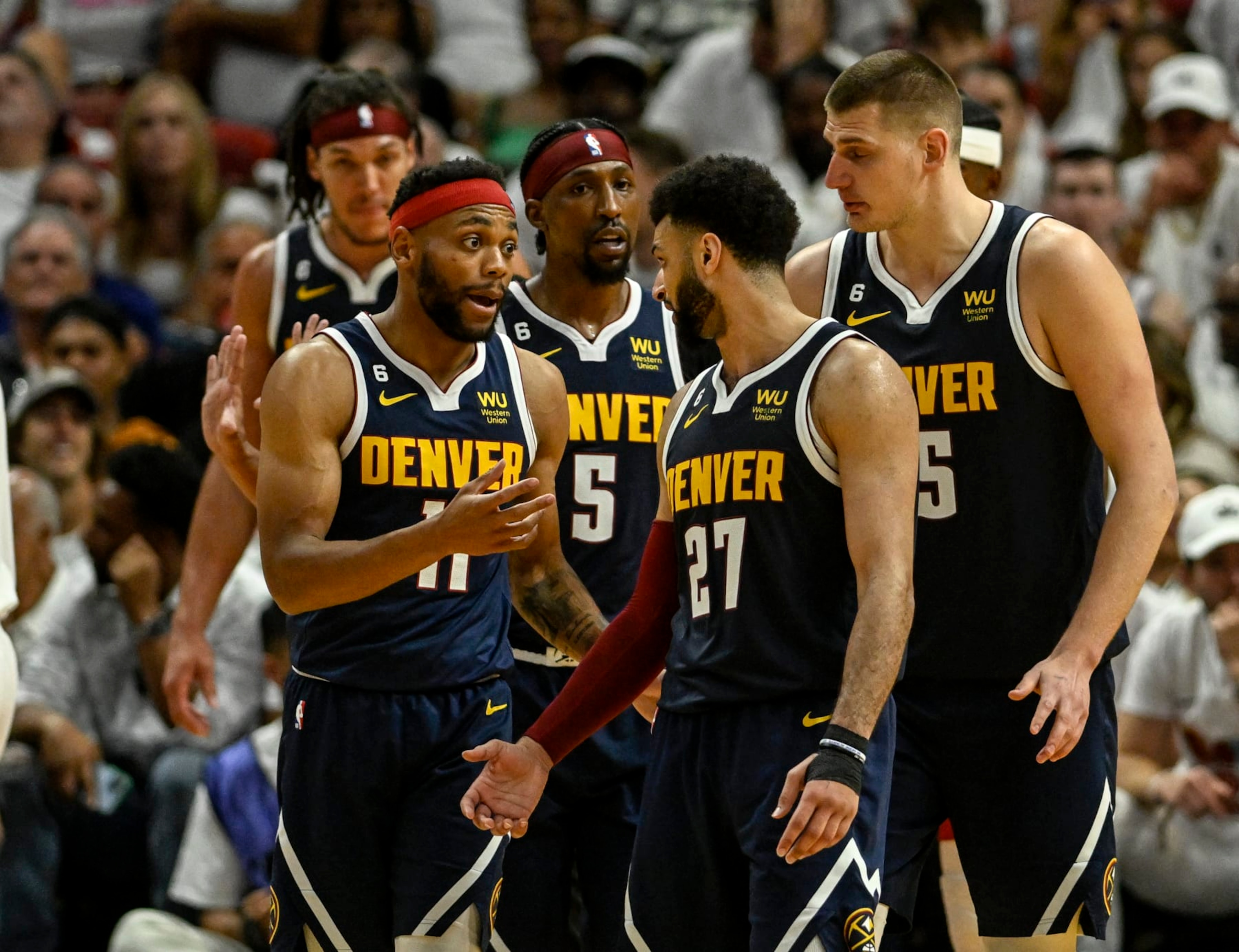 MIAMI, FL - JUNE 9: Bruce Brown (11), Jamal Murray (27), Nikola Jokic (15), Kentavious Caldwell-Pope (5) and Aaron Gordon (50) of the Denver Nuggets work together to dissect the Miami Heat in the fourth quarter of the Nuggets' 108-95 win during Game 4 of the NBA Finals at the Kaseya Center in Miami on Friday, June 9, 2023. (Photo by AAron Ontiveroz/The Denver Post)
