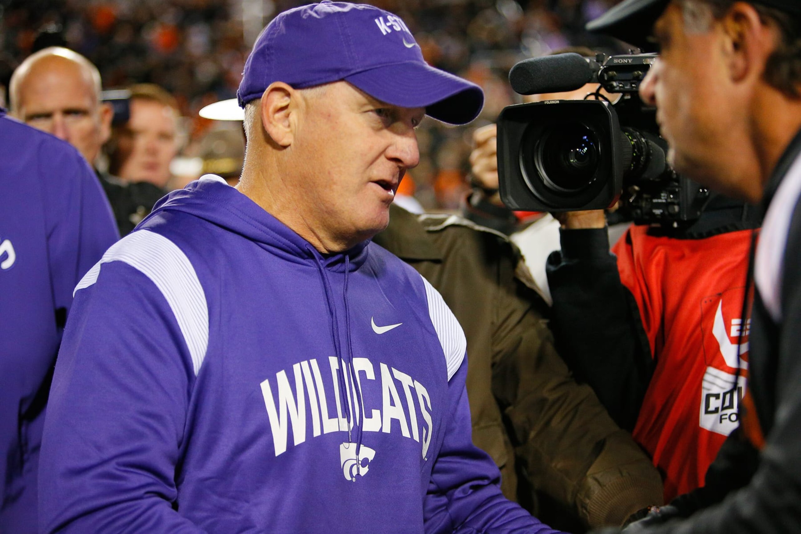 STILLWATER, OK - OCTOBER 6:  Head coach Chris Klieman of the Kansas State Wildcats shakes hands with head coach Mike Gundy of the Oklahoma State Cowboys at Boone Pickens Stadium on October 6, 2023 in Stillwater, Oklahoma.  Oklahoma State won 29-21.  (Photo by Brian Bahr/Getty Images)