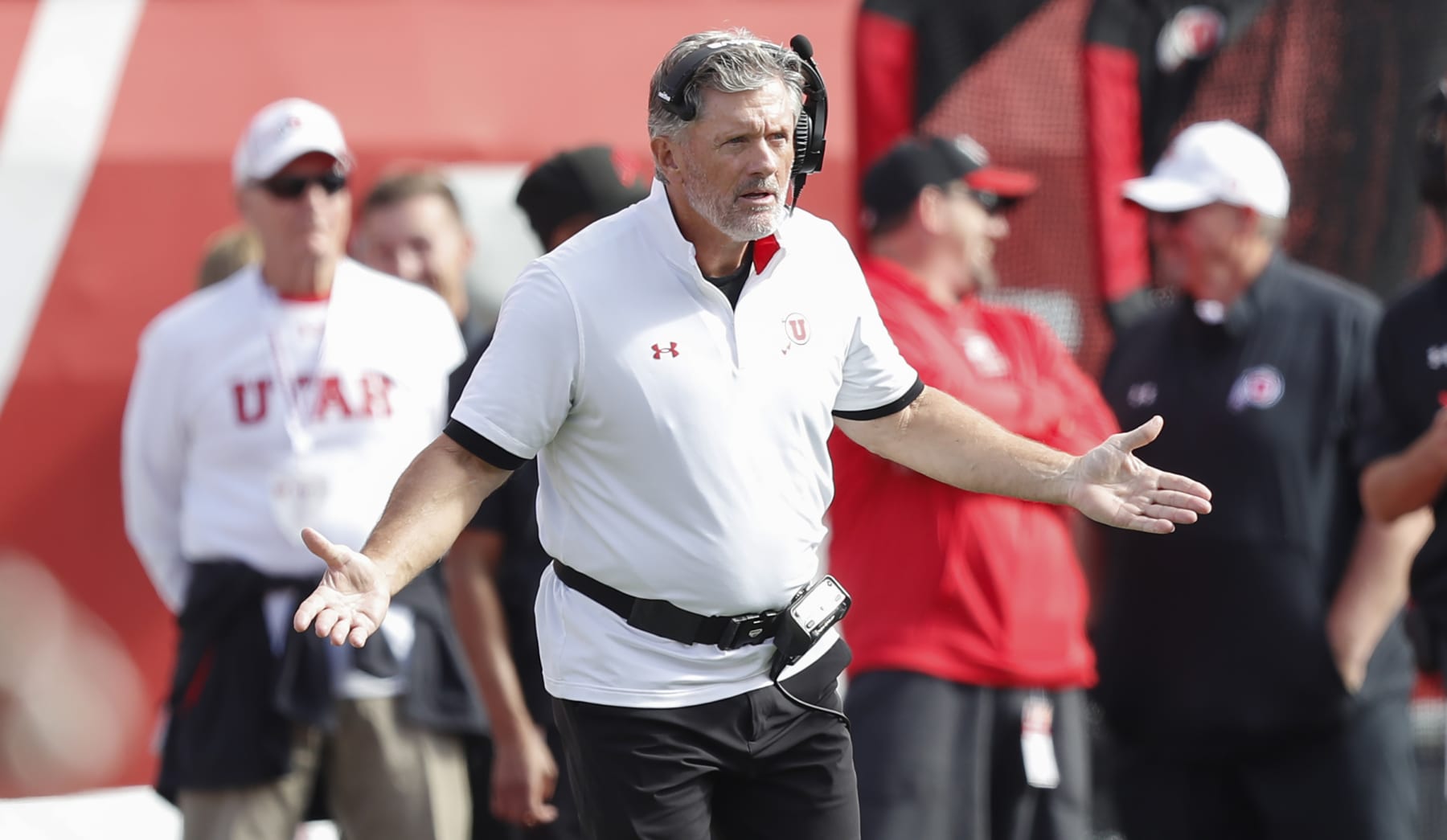 SALT LAKE CITY, UT - OCTOBER 14: Head coach Kyle Whittingham of the Utah Utes questions an official's call during the first half of their game against the California Golden Bears at Rice-Eccles Stadium October 14, 2023 in Salt Lake City, Utah. (Photo by Chris Gardner/Getty Images)