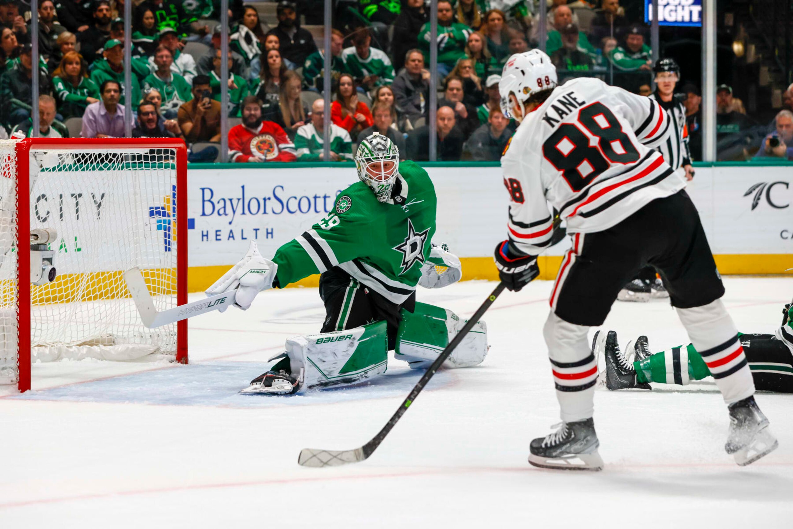 DALLAS, TX - FEBRUARY 22: Chicago Blackhawks right wing Patrick Kane (88) shoots the puck pass Dallas Stars goaltender Jake Oettinger (29) for a goal during the game between the Dallas Stars and the Chicago Blackhawks on February 22, 2023 at American Airlines Center in Dallas, Texas. (Photo by Matthew Pearce/Icon Sportswire via Getty Images)