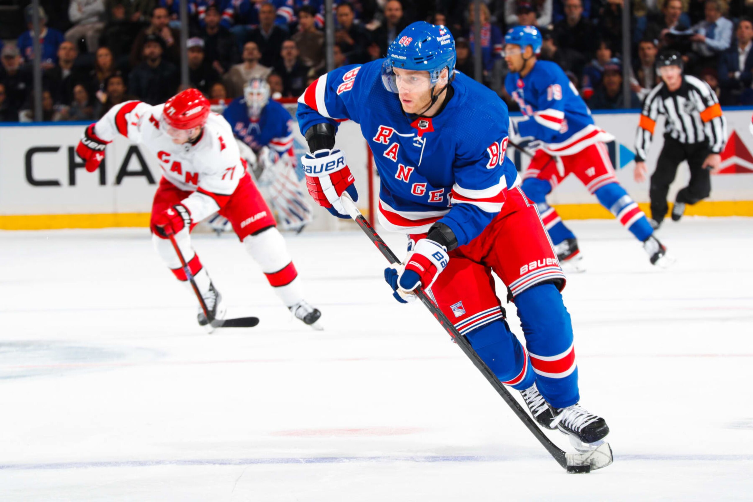 NEW YORK, NEW YORK - MARCH 21:  Patrick Kane #88 of the New York Rangers skates with the puck against the Carolina Hurricanes at Madison Square Garden on March 21, 2023 in New York City. (Photo by Jared Silber/NHLI via Getty Images)