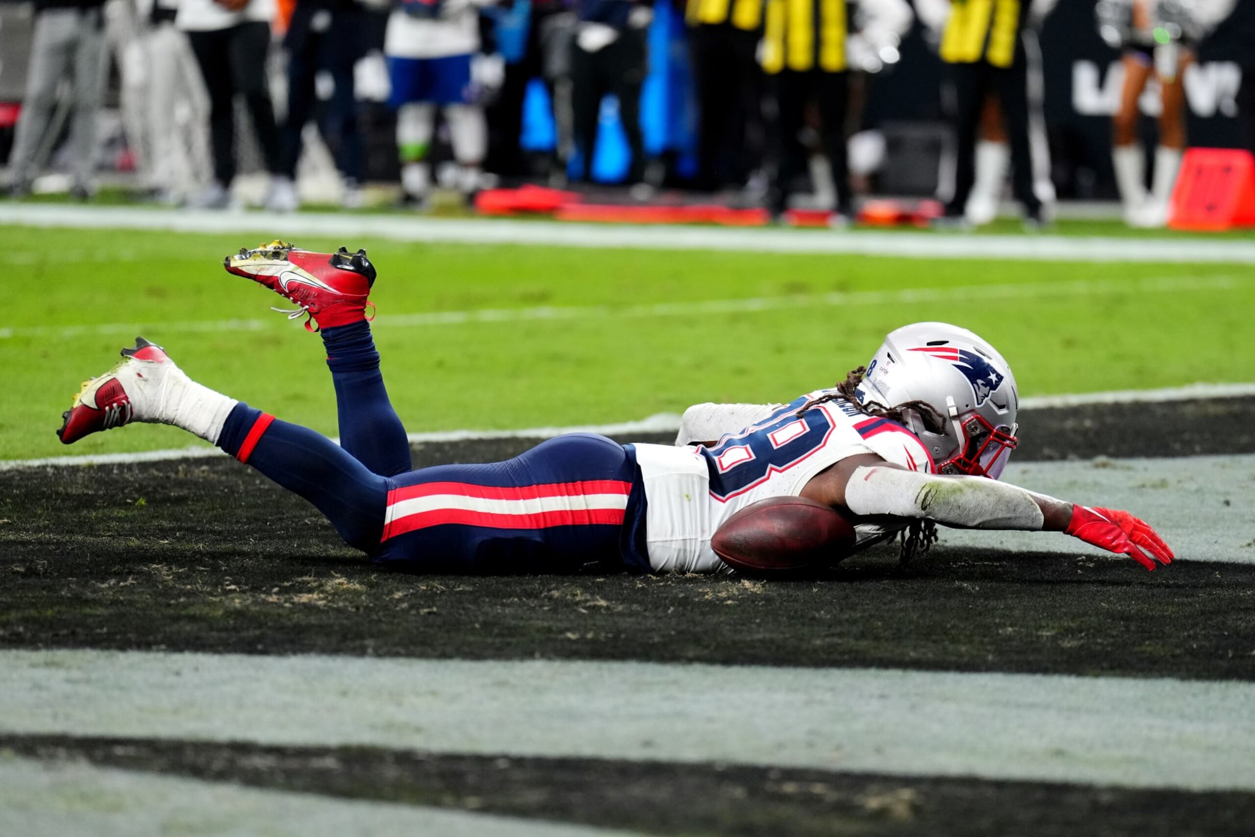 LAS VEGAS, NEVADA - OCTOBER 15: Rhamondre Stevenson #38 of the New England Patriots celebrates after scoring a rushing touchdown during the fourth quarter against the Las Vegas Raiders at Allegiant Stadium on October 15, 2023 in Las Vegas, Nevada. (Photo by Chris Unger/Getty Images)