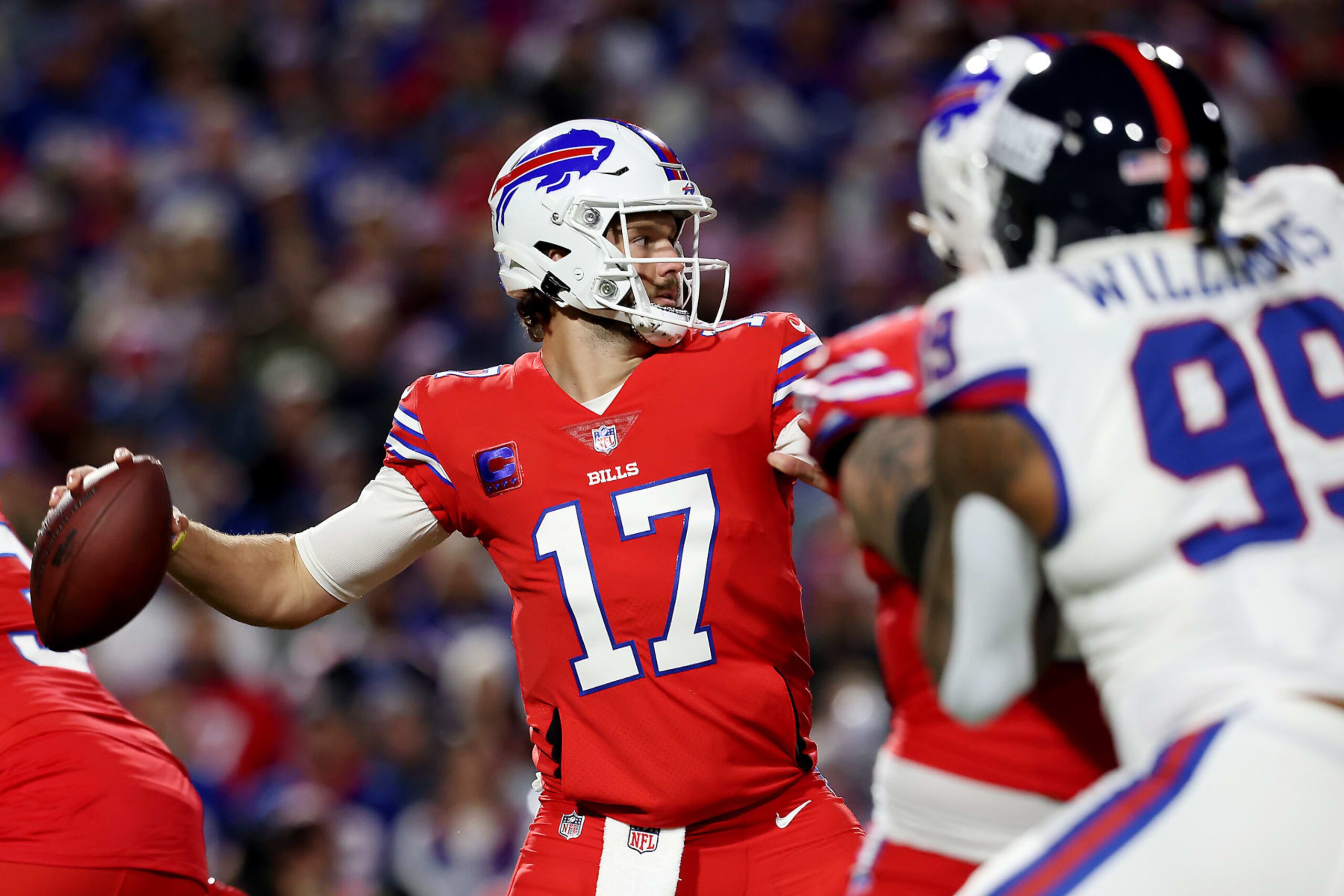 ORCHARD PARK, NEW YORK - OCTOBER 15: Josh Allen #17 of the Buffalo Bills throws a pass in the first quarter of a game against the New York Giants at Highmark Stadium on October 15, 2023 in Orchard Park, New York. (Photo by Bryan M. Bennett/Getty Images)