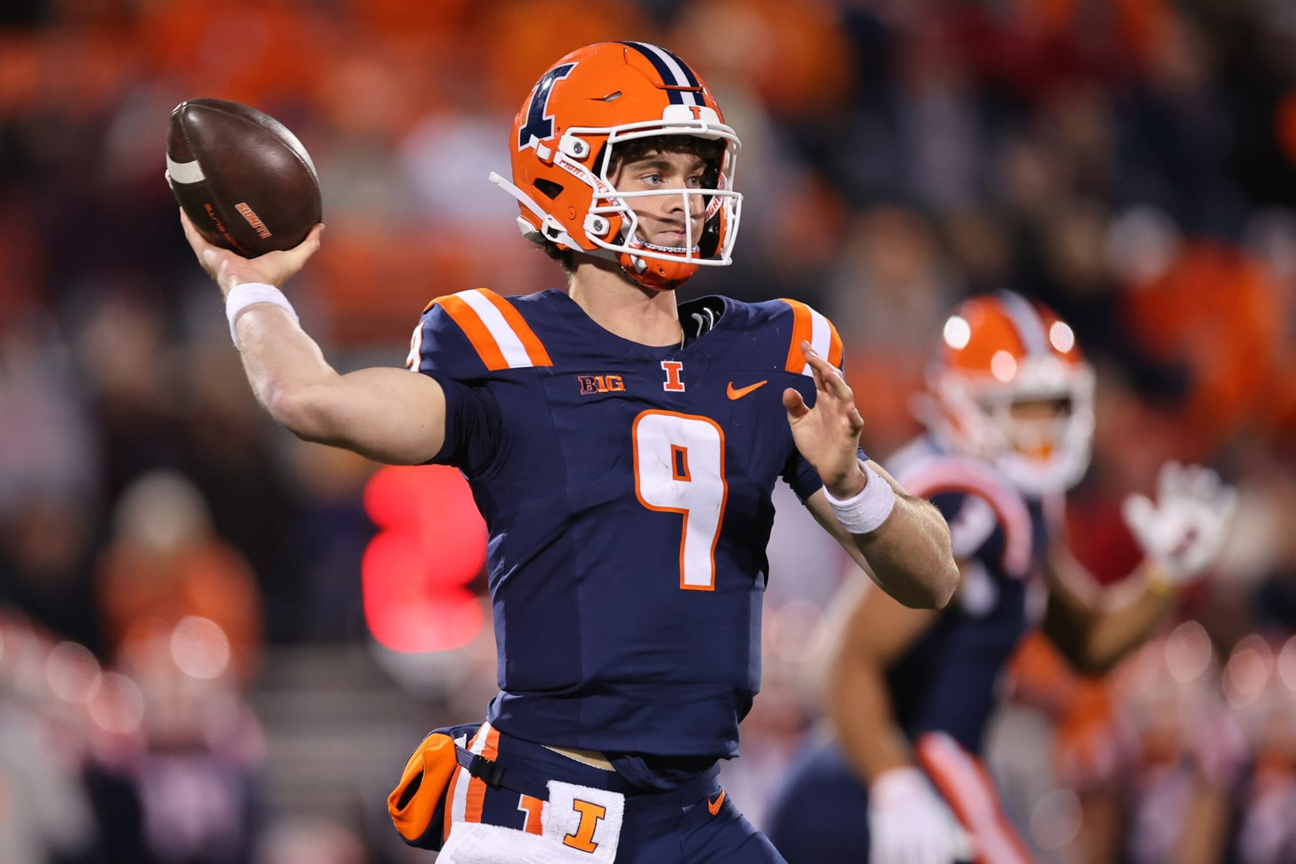 CHAMPAIGN, ILLINOIS - OCTOBER 06: Luke Altmyer #9 of the Illinois Fighting Illini throws a pass against the Nebraska Cornhuskers during the second half at Memorial Stadium on October 06, 2023 in Champaign, Illinois. (Photo by Michael Reaves/Getty Images)