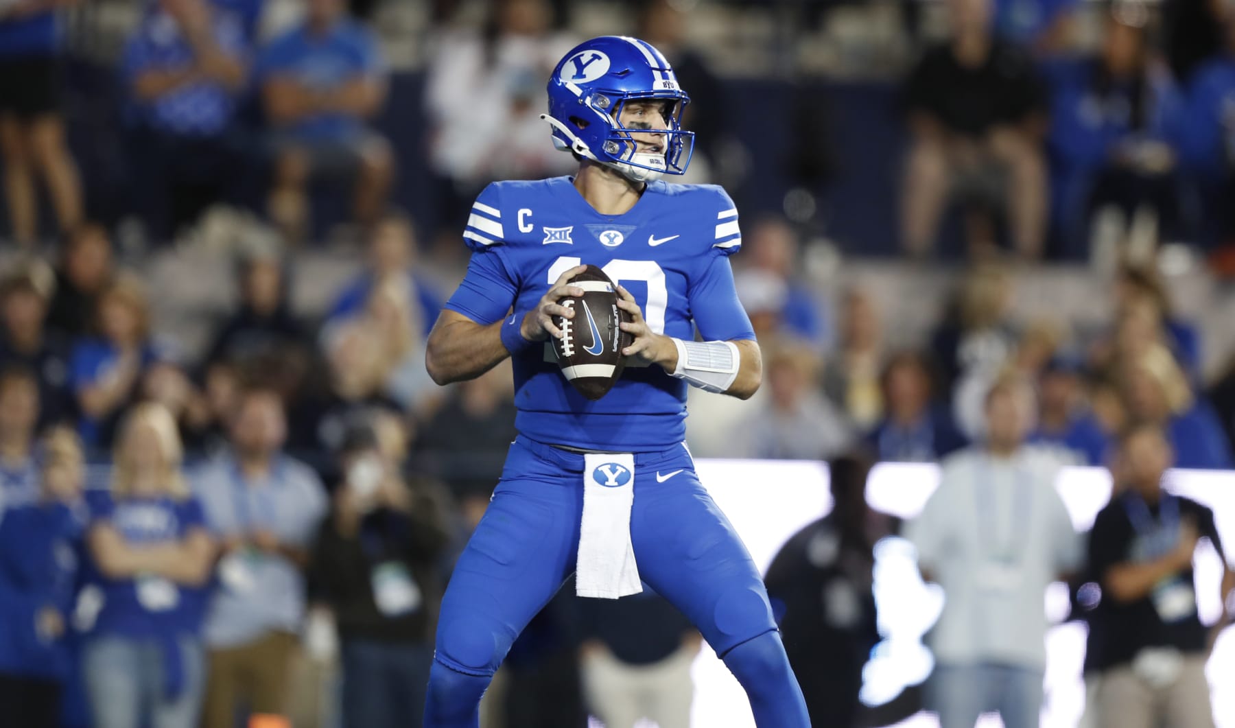 PROVO, UT - SEPTEMBER 29: Kedon Slovis #10 of the Brigham Young Cougars drops in the pocket against the Cincinnati Bearcats during the first half of their game at LaVell Edwards Stadium September 29, 2023 in Provo, Utah. (Photo by Chris Gardner/Getty Images)