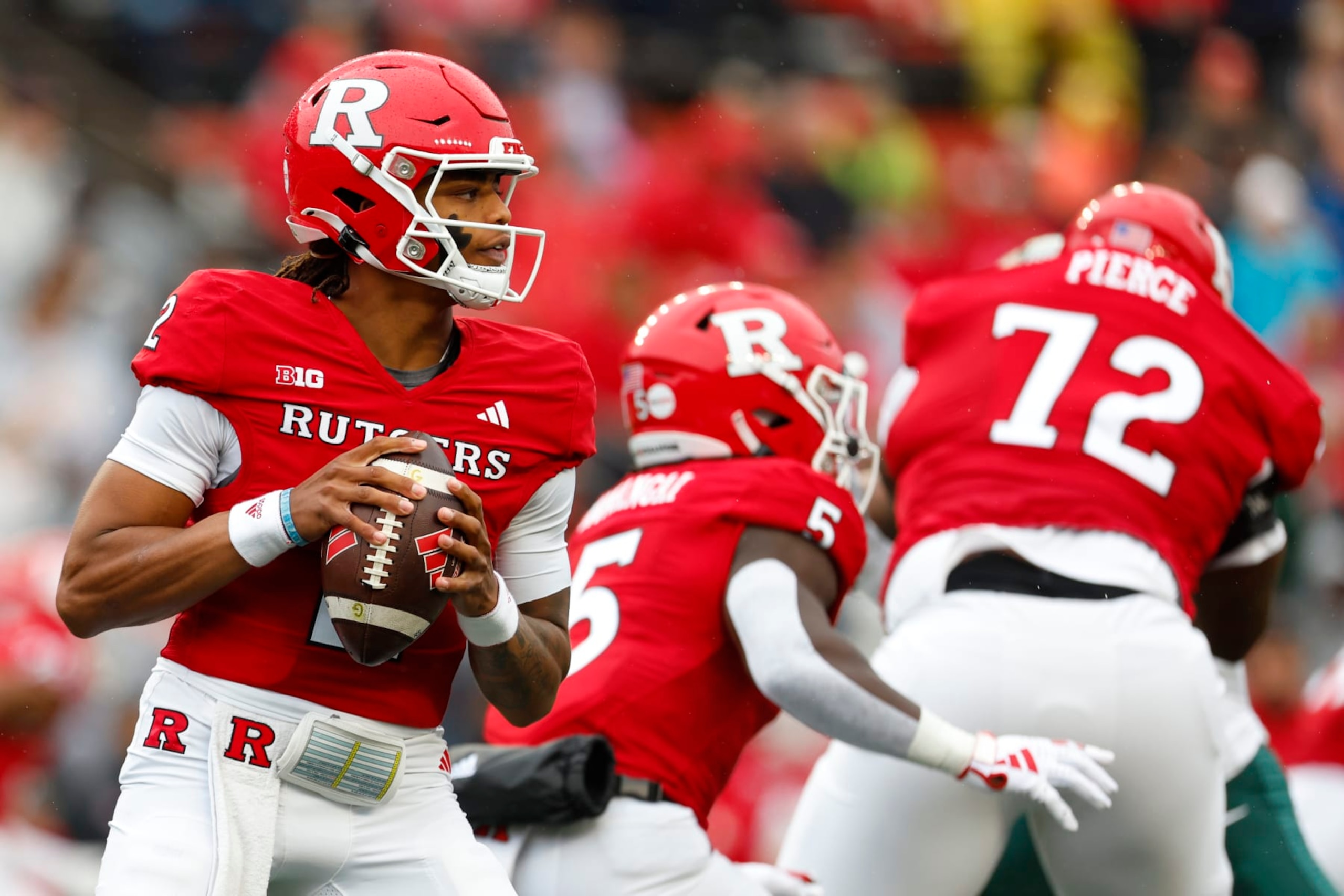 PISCATAWAY, NEW JERSEY - OCTOBER 14: Quarterback Gavin Wimsatt #2 of the Rutgers Scarlet Knights in action against the Michigan State Spartans during a college football game at SHI Stadium on October 14, 2023 in Piscataway, New Jersey. (Photo by Rich Schultz/Getty Images) PISCATAWAY, NEW JERSEY - OCTOBER 14: Quarterback Gavin Wimsatt #2 of the Rutgers Scarlet Knights in action against the Michigan State Spartans during a college football game at SHI Stadium on October 14, 2023 in Piscataway, New Jersey. (Photo by Rich Schultz/Getty Images)