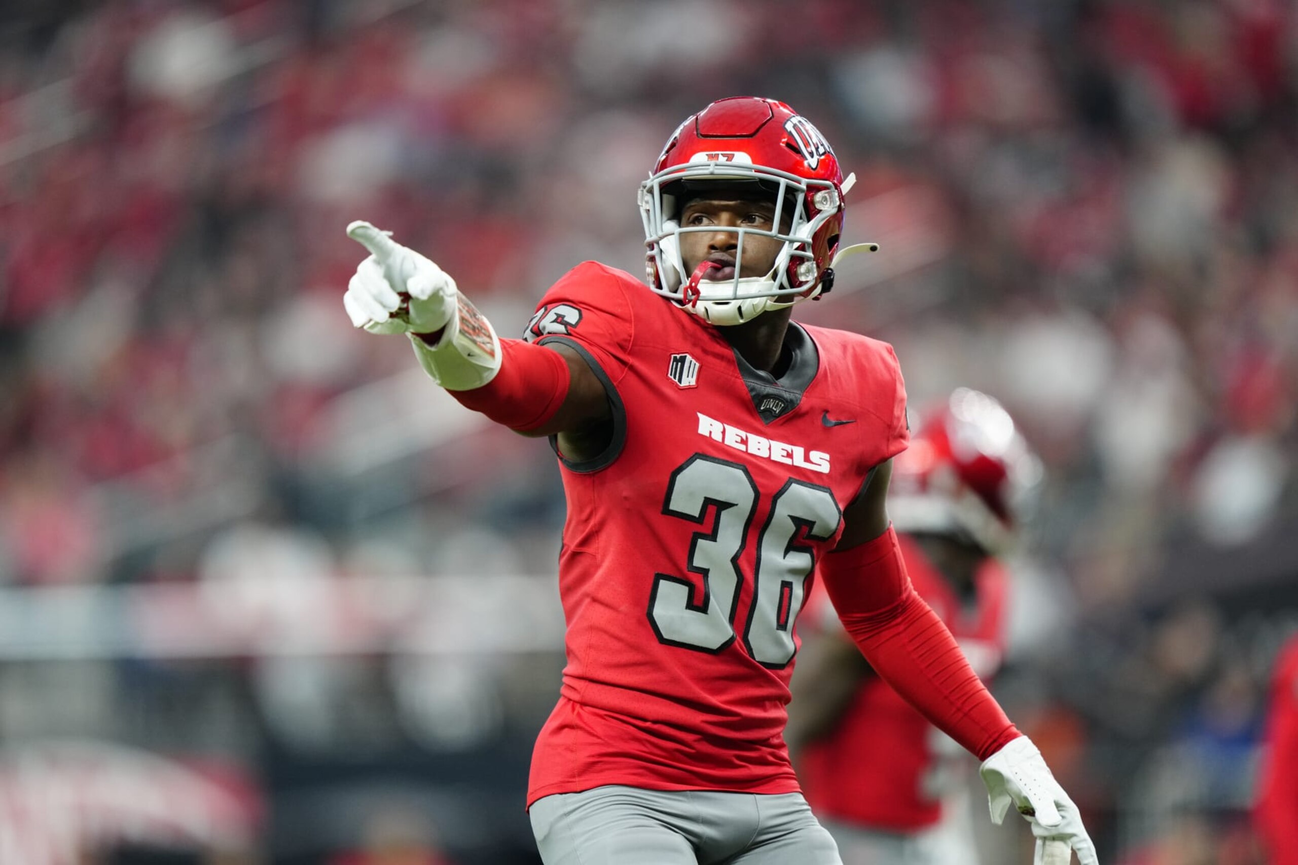 LAS VEGAS, NEVADA - SEPTEMBER 30: Thomas Anderson #36 of the UNLV Rebels gestures in the second half of a game against the Hawaii Warriors at Allegiant Stadium on September 30, 2023 in Las Vegas, Nevada. Rebels defeat the Warriors 44-20. (Photo by Louis Grasse/Getty Images) LAS VEGAS, NEVADA - SEPTEMBER 30: Thomas Anderson #36 of the UNLV Rebels gestures in the second half of a game against the Hawaii Warriors at Allegiant Stadium on September 30, 2023 in Las Vegas, Nevada. Rebels defeat the Warriors 44-20. (Photo by Louis Grasse/Getty Images)