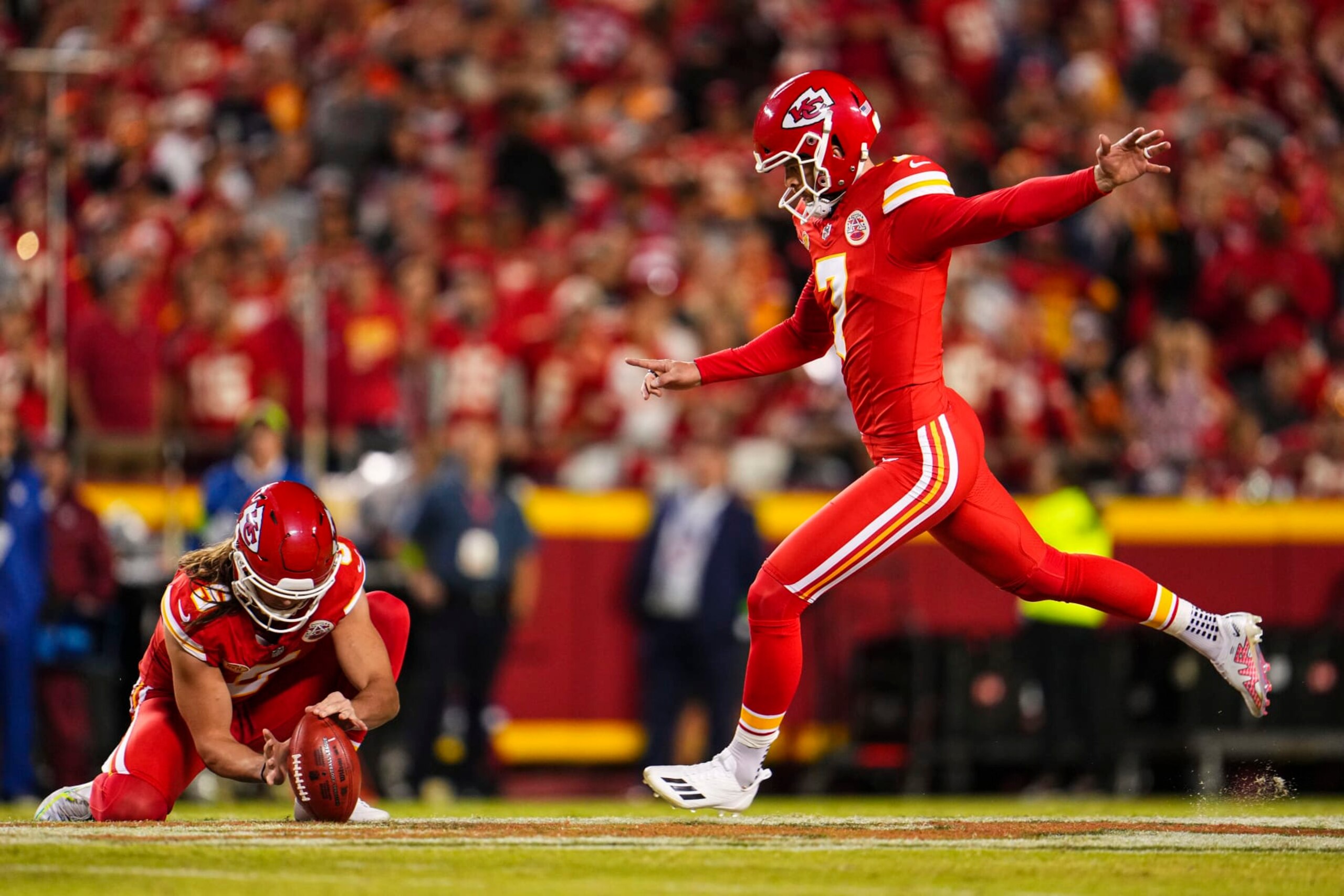 KANSAS CITY, MO - OCTOBER 12: Harrison Butker #7 of the Kansas City Chiefs kicks for a field goal during an NFL football game against the Denver Broncos at GEHA Field at Arrowhead Stadium on October 12, 2023 in Kansas City, Missouri. (Photo by Cooper Neill/Getty Images)