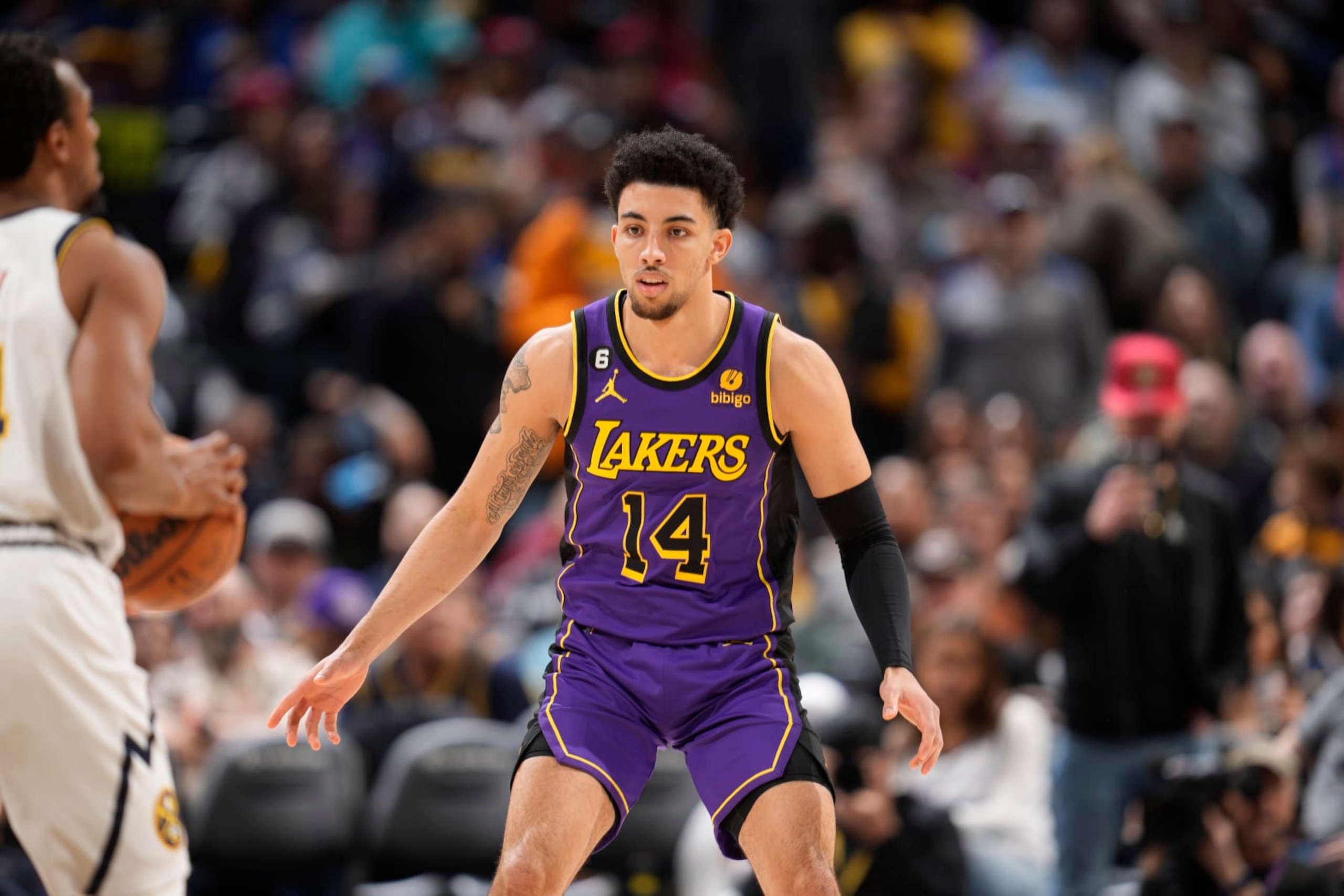 Los Angeles Lakers guard Scotty Pippen Jr. (14) in the second half of an NBA basketball game Monday, Jan. 9, 2023, in Denver. (AP Photo/David Zalubowski)