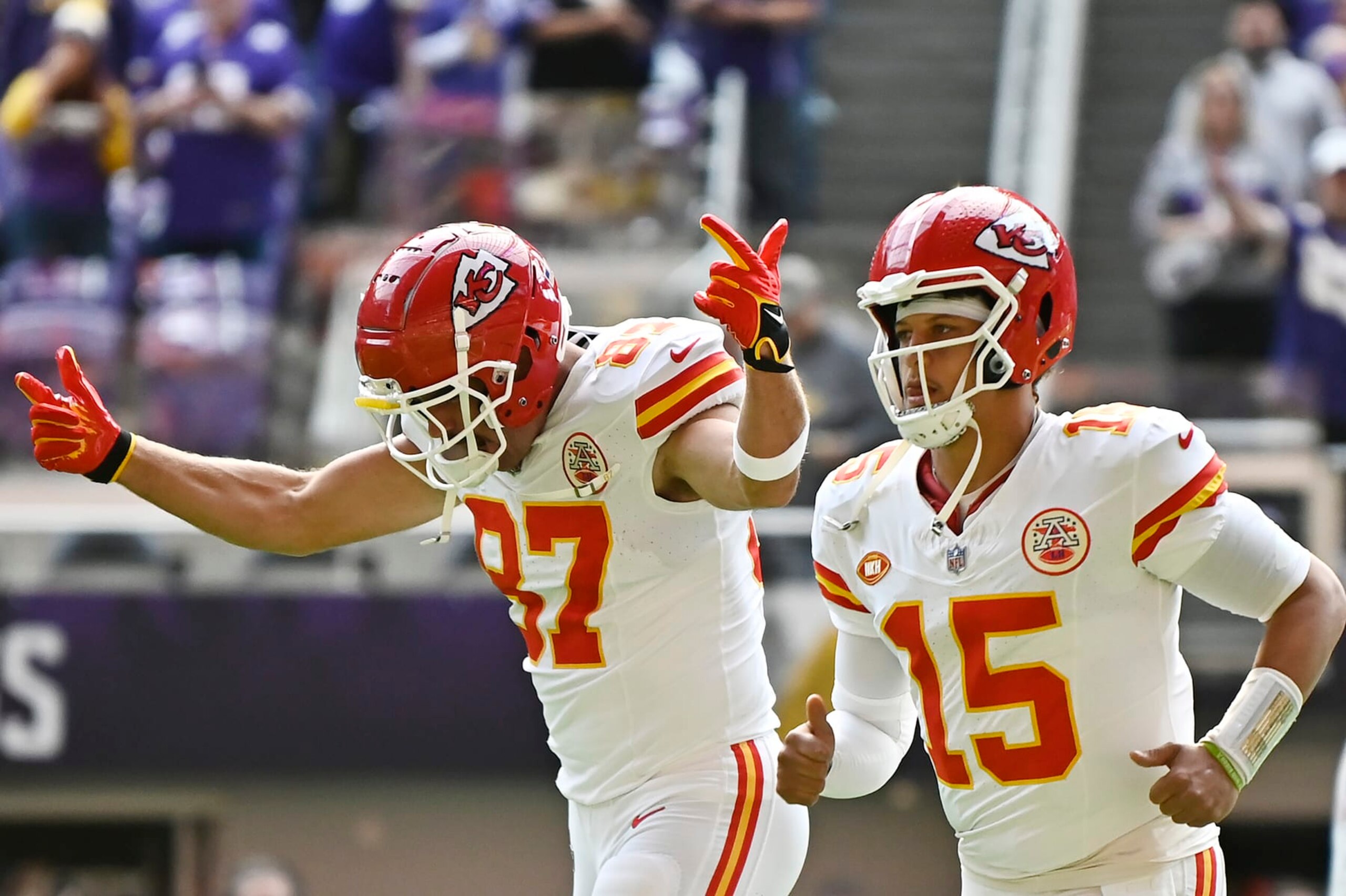 MINNEAPOLIS, MINNESOTA - OCTOBER 08: Travis Kelce #87 of the Kansas City Chiefs and Patrick Mahomes #15 of the Kansas City Chiefs run onto the filed prior to a game against the Minnesota Vikings at U.S. Bank Stadium on October 08, 2023 in Minneapolis, Minnesota. (Photo by Stephen Maturen/Getty Images)
