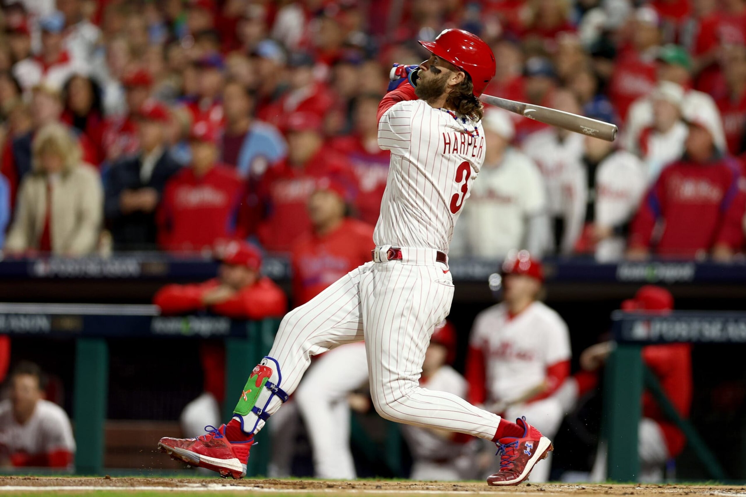 PHILADELPHIA, PENNSYLVANIA - OCTOBER 16: Bryce Harper #3 of the Philadelphia Phillies hits a solo home run in the first inning against the Arizona Diamondbacks during Game One of the Championship Series at Citizens Bank Park on October 16, 2023 in Philadelphia, Pennsylvania. (Photo by Elsa/Getty Images)