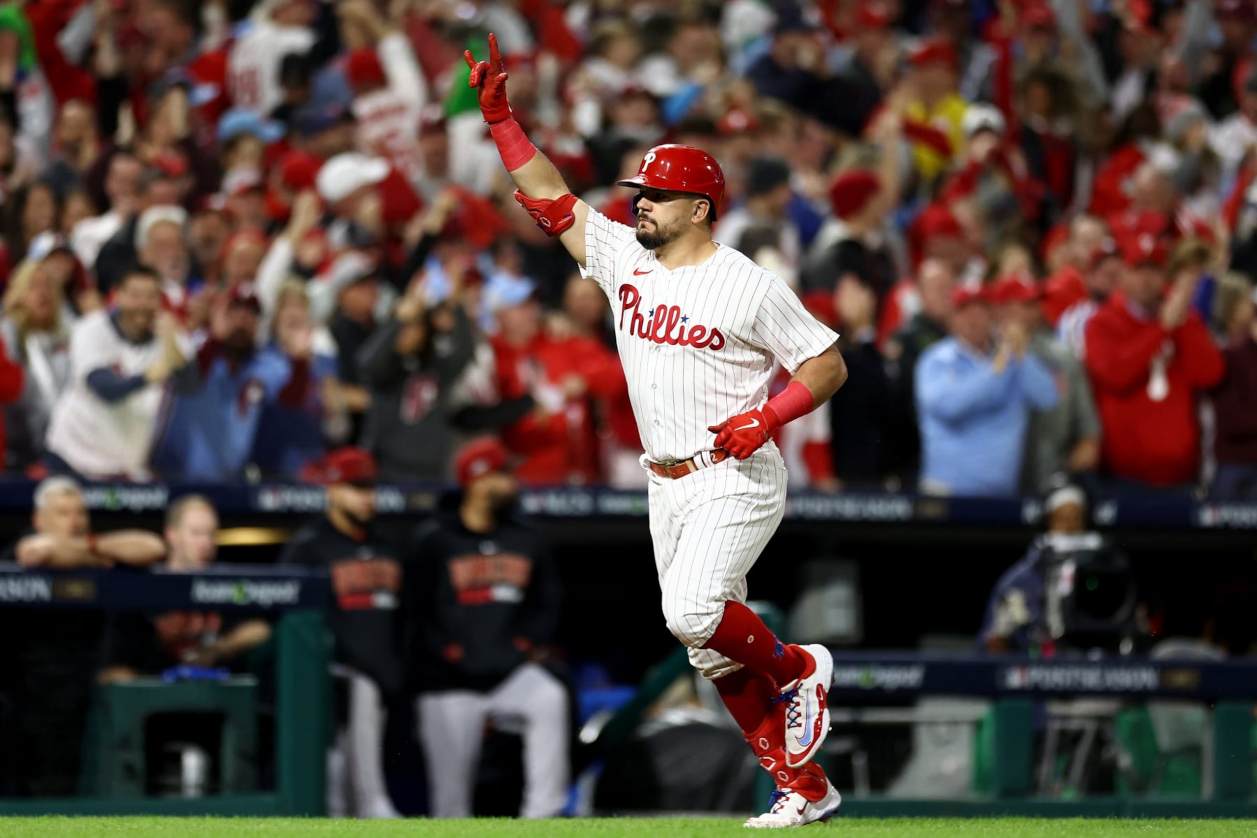 PHILADELPHIA, PENNSYLVANIA - OCTOBER 16: Kyle Schwarber #12 of the Philadelphia Phillies rounds the bases after hitting a solo home run in the first inning against the Arizona Diamondbacks during Game One of the Championship Series at Citizens Bank Park on October 16, 2023 in Philadelphia, Pennsylvania. (Photo by Tim Nwachukwu/Getty Images)
