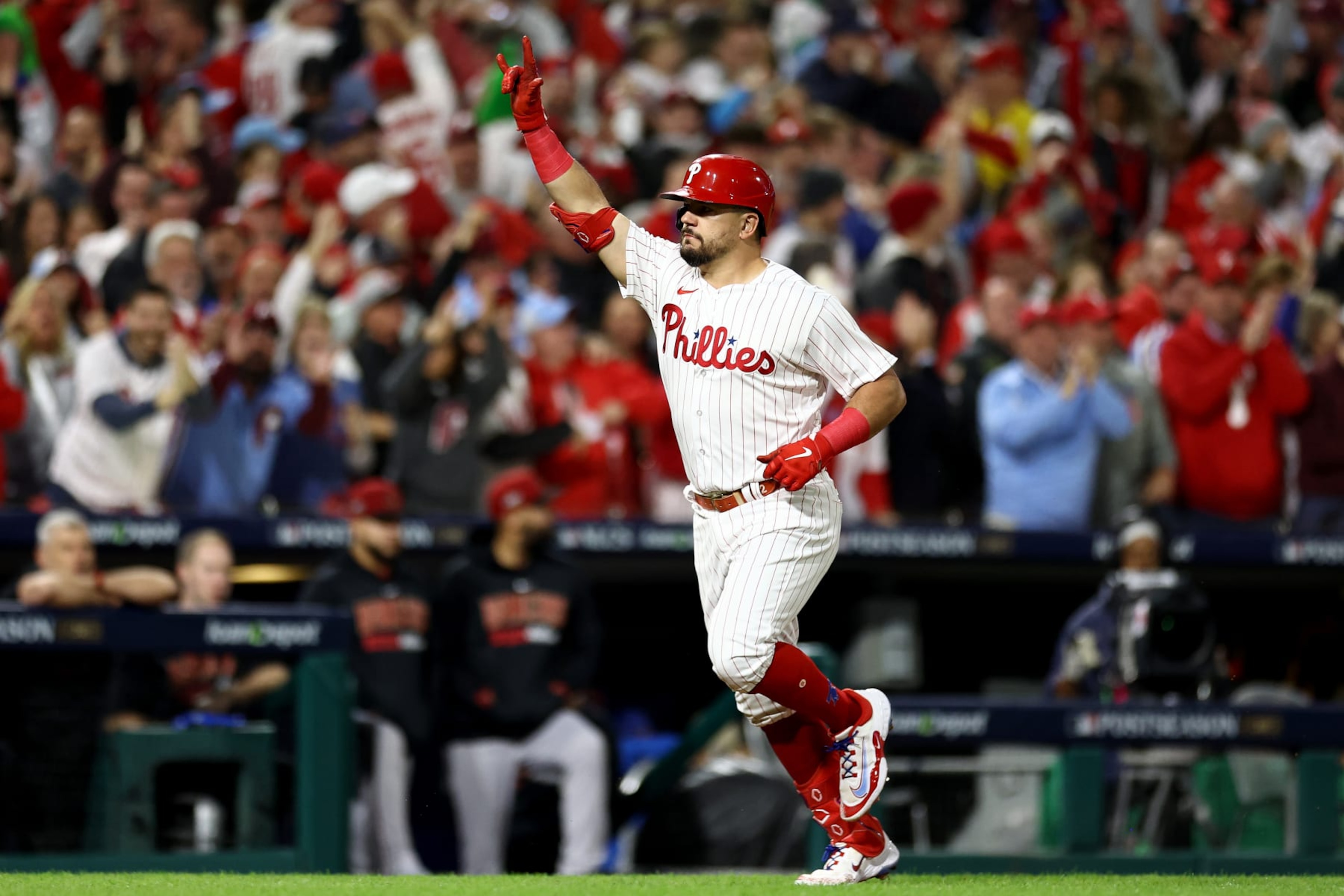 PHILADELPHIA, PENNSYLVANIA - OCTOBER 16: Kyle Schwarber #12 of the Philadelphia Phillies rounds the bases after hitting a solo home run in the first inning against the Arizona Diamondbacks during Game One of the Championship Series at Citizens Bank Park on October 16, 2023 in Philadelphia, Pennsylvania. (Photo by Tim Nwachukwu/Getty Images)