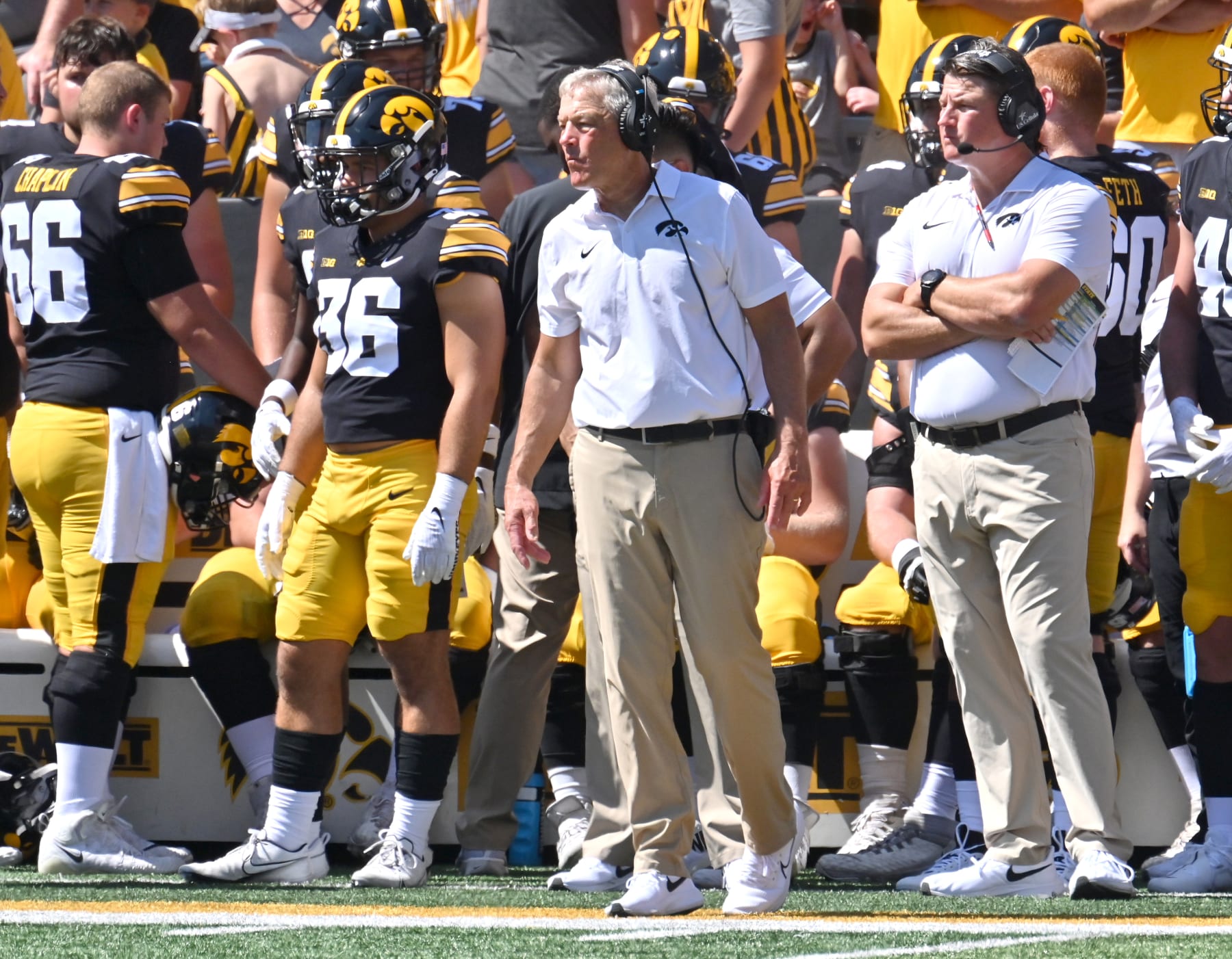 IOWA CITY, IA - SEPTEMBER 02: Iowa Hawkeyes head coach Kirk Ferentz and Iowa Hawkeyes offensive coordinator Brian Ferentz watch their team play during a college football game between the Utah State Aggies and the Iowa Hawkeyes on September 02, 2023,  at Kinnick Stadium in Iowa City, Ia. (Photo by Keith Gillett/Icon Sportswire via Getty Images)