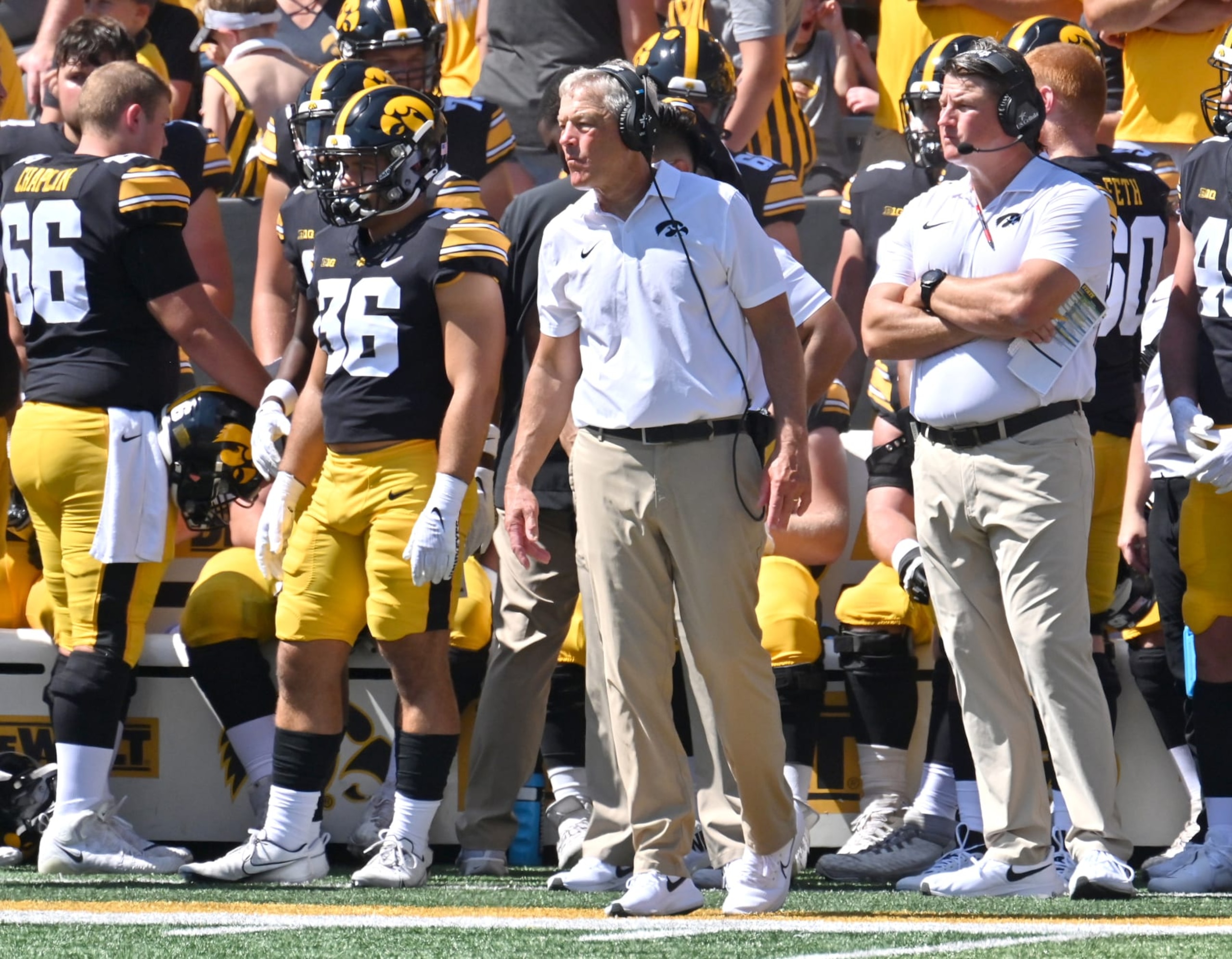 IOWA CITY, IA - SEPTEMBER 02: Iowa Hawkeyes head coach Kirk Ferentz and Iowa Hawkeyes offensive coordinator Brian Ferentz watch their team play during a college football game between the Utah State Aggies and the Iowa Hawkeyes on September 02, 2023,  at Kinnick Stadium in Iowa City, Ia. (Photo by Keith Gillett/Icon Sportswire via Getty Images)
