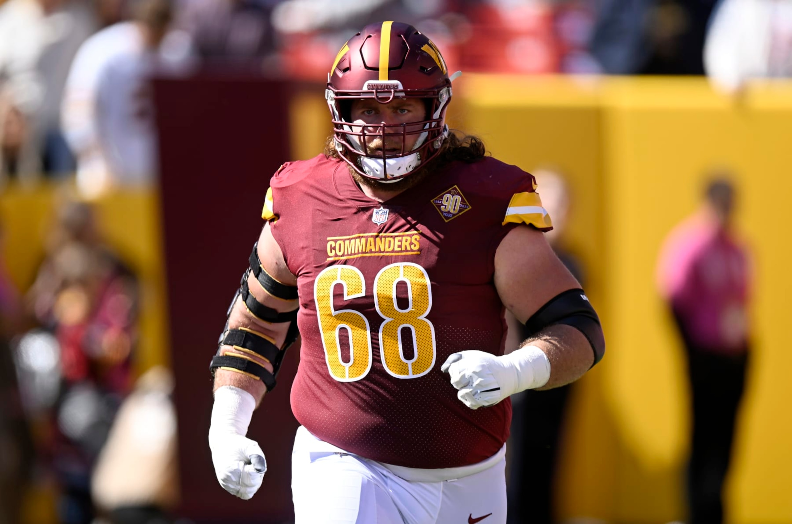LANDOVER, MARYLAND - OCTOBER 09: Andrew Norwell #68 of the Washington Commanders is introduced before the game against the Tennessee Titans at FedExField on October 09, 2022 in Landover, Maryland. (Photo by G Fiume/Getty Images)