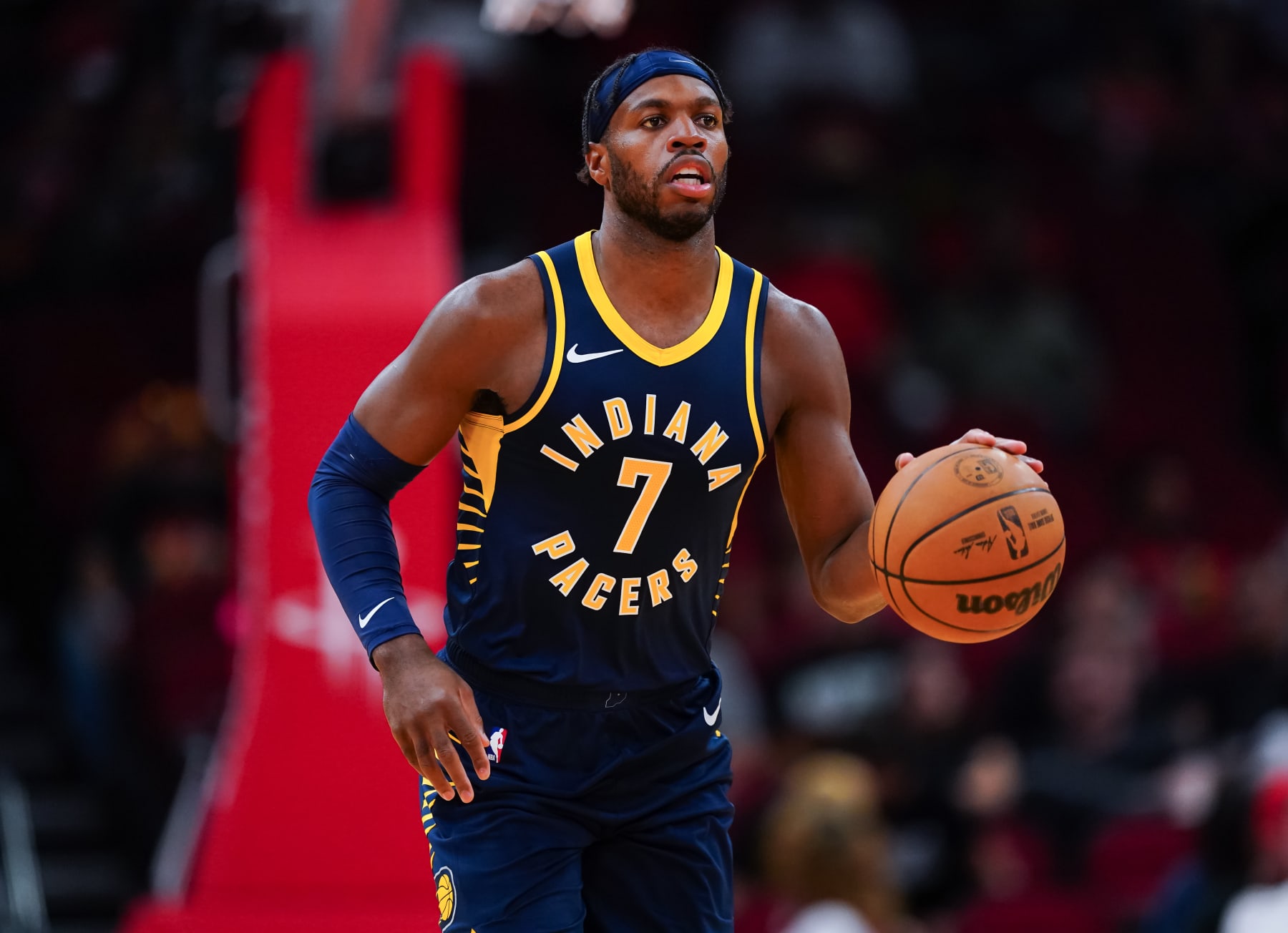 HOUSTON, TEXAS - OCTOBER 10: Buddy Hield #7 of the Indiana Pacers dribbles the ball during the preseason game against the Houston Rockets at Toyota Center on October 10, 2023 in Houston, Texas. NOTE TO USER: User expressly acknowledges and agrees that, by downloading and or using this photograph, User is consenting to the terms and conditions of the Getty Images License Agreement. (Photo by Alex Bierens de Haan/Getty Images)