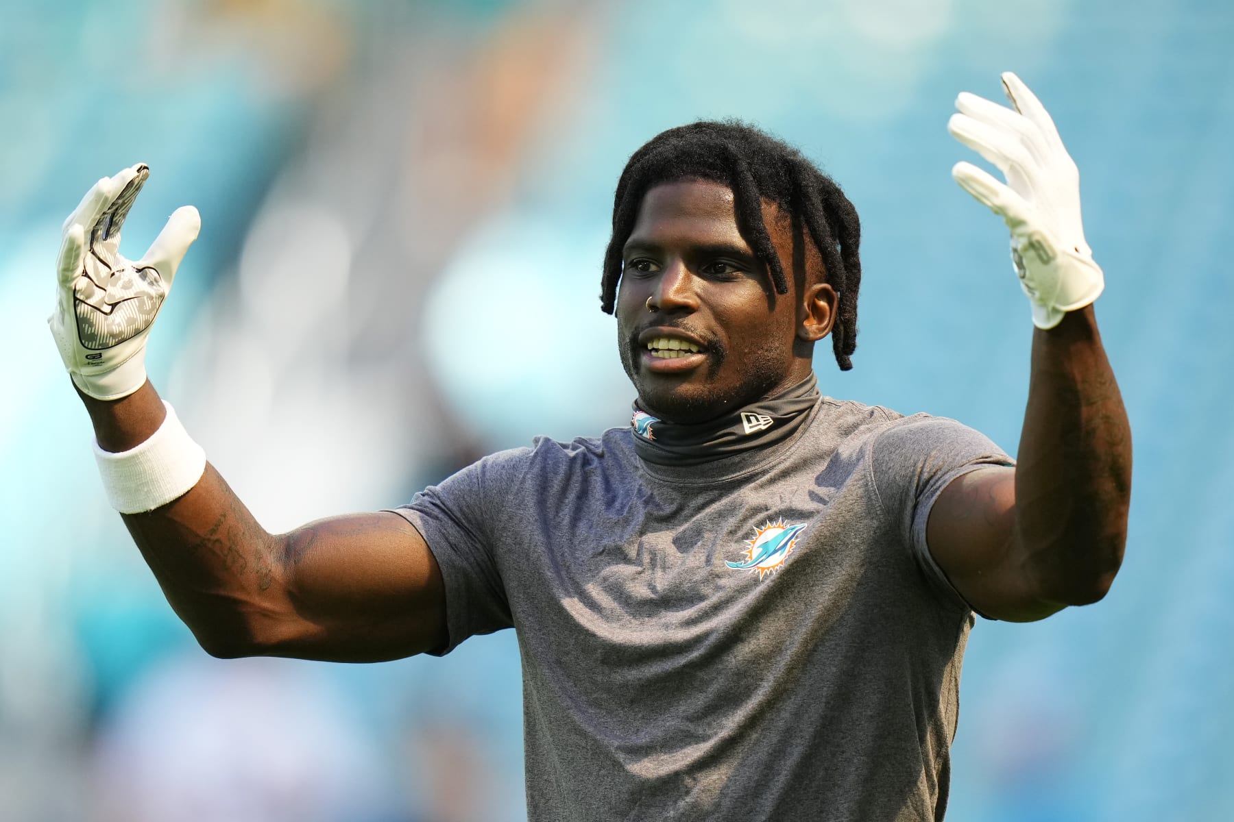 MIAMI GARDENS, FLORIDA - OCTOBER 15: Tyreek Hill #10 of the Miami Dolphins warms up before the game against the Carolina Panthers at Hard Rock Stadium on October 15, 2023 in Miami Gardens, Florida. (Photo by Rich Storry/Getty Images)