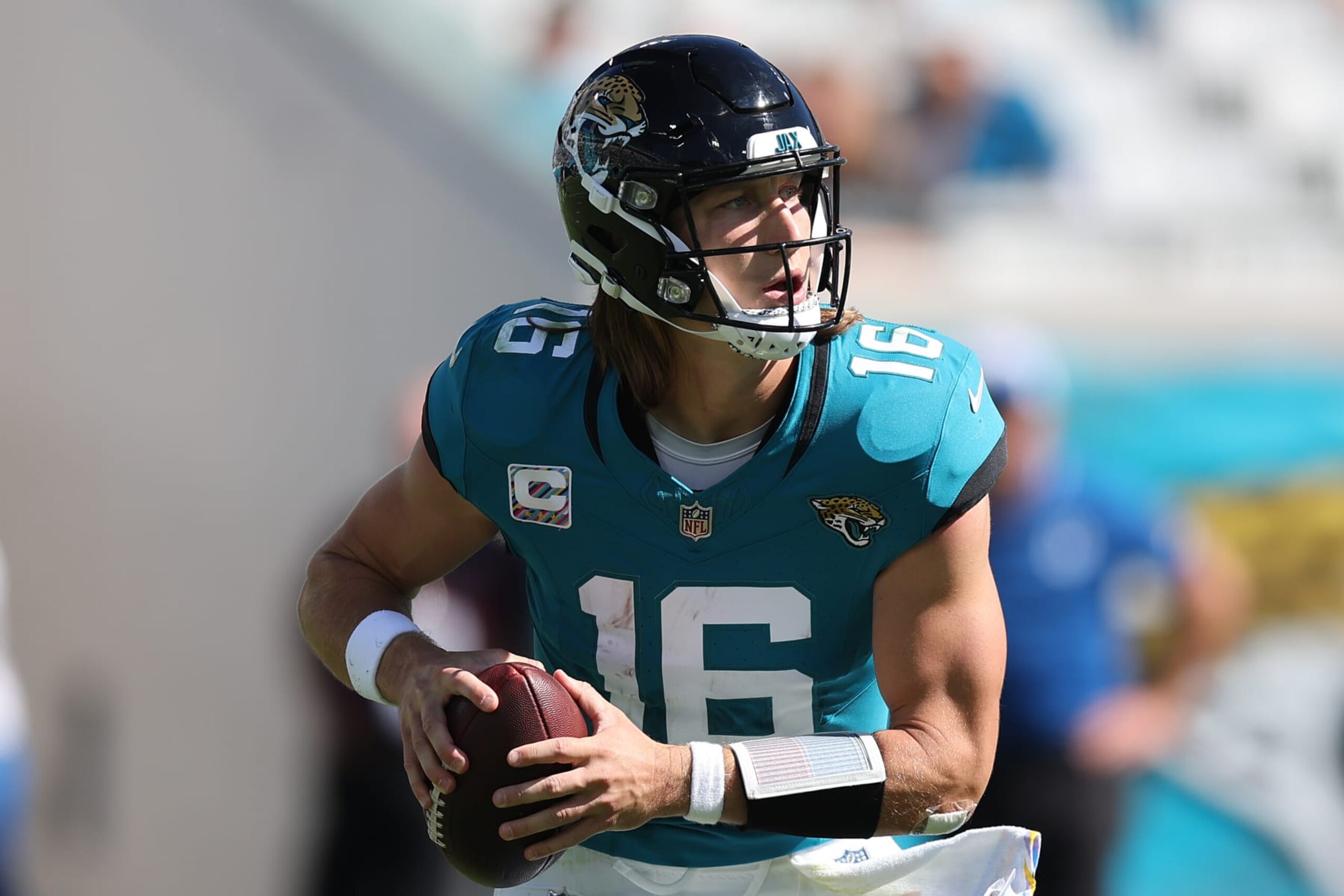 JACKSONVILLE, FLORIDA - OCTOBER 15: Trevor Lawrence #16 of the Jacksonville Jaguars looks to pass during the third quarter against the Indianapolis Colts at EverBank Stadium on October 15, 2023 in Jacksonville, Florida. (Photo by Mike Carlson/Getty Images)
