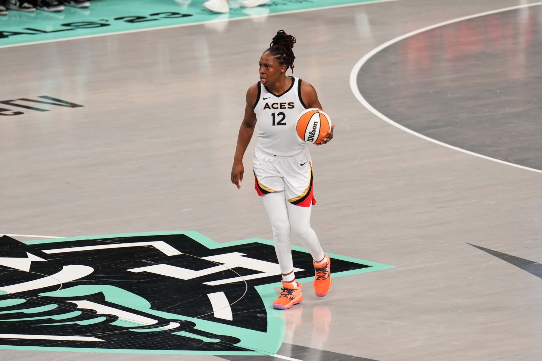 BROOKLYN, NY - OCTOBER 15: Chelsea Gray #12 of the Las Vegas Aces dribbles the ball during the game against the New York Liberty during game 3 of the 2023 WNBA Finals on October 15, 2023 at the Barclays Center in Brooklyn, New York. NOTE TO USER: User expressly acknowledges and agrees that, by downloading and or using this photograph, user is consenting to the terms and conditions of the Getty Images License Agreement. Mandatory Copyright Notice: Copyright 2023 NBAE (Photo by Evan Yu/NBAE via Getty Images)
