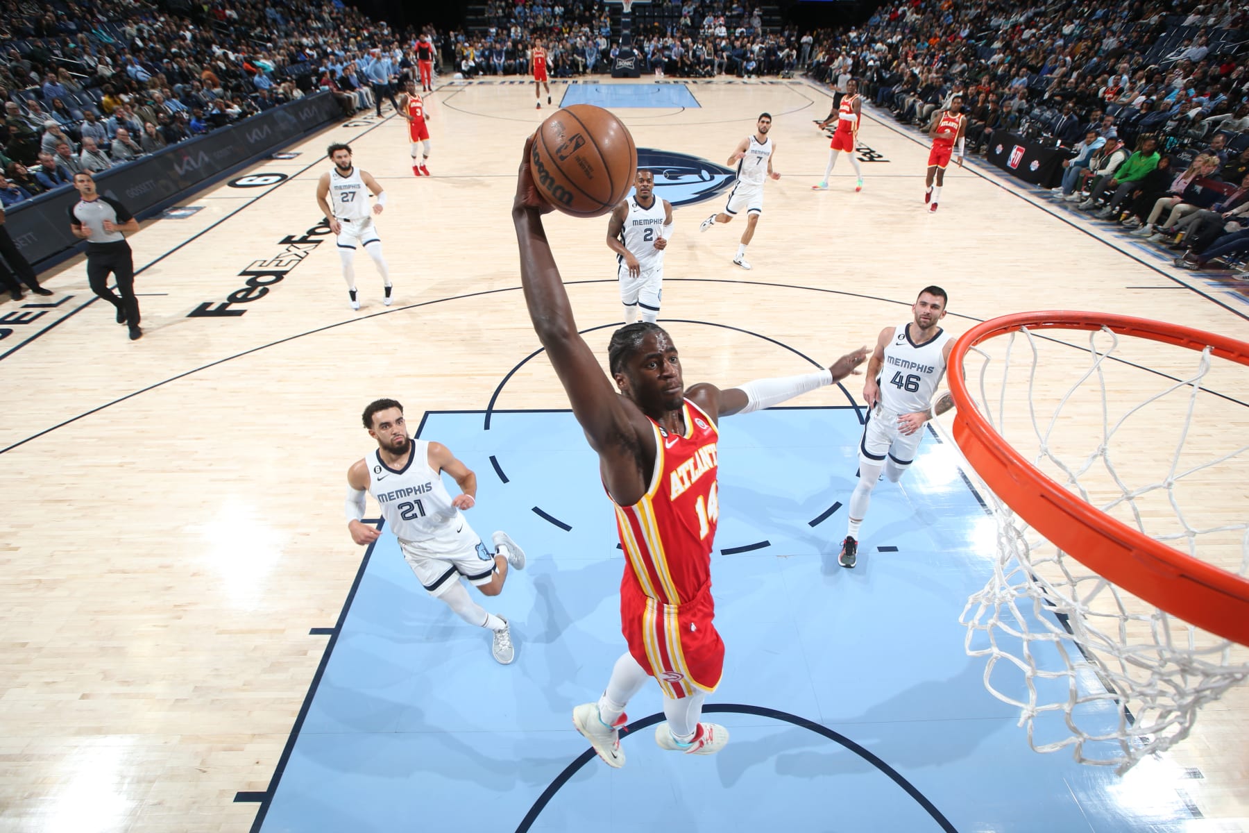 MEMPHIS, TN - DECEMBER 12: AJ Griffin #14 of the Atlanta Hawks dunks the ball during the game against the Memphis Grizzlies on December 12, 2022 at FedExForum in Memphis, Tennessee. NOTE TO USER: User expressly acknowledges and agrees that, by downloading and or using this photograph, User is consenting to the terms and conditions of the Getty Images License Agreement. Mandatory Copyright Notice: Copyright 2022 NBAE (Photo by Joe Murphy/NBAE via Getty Images)