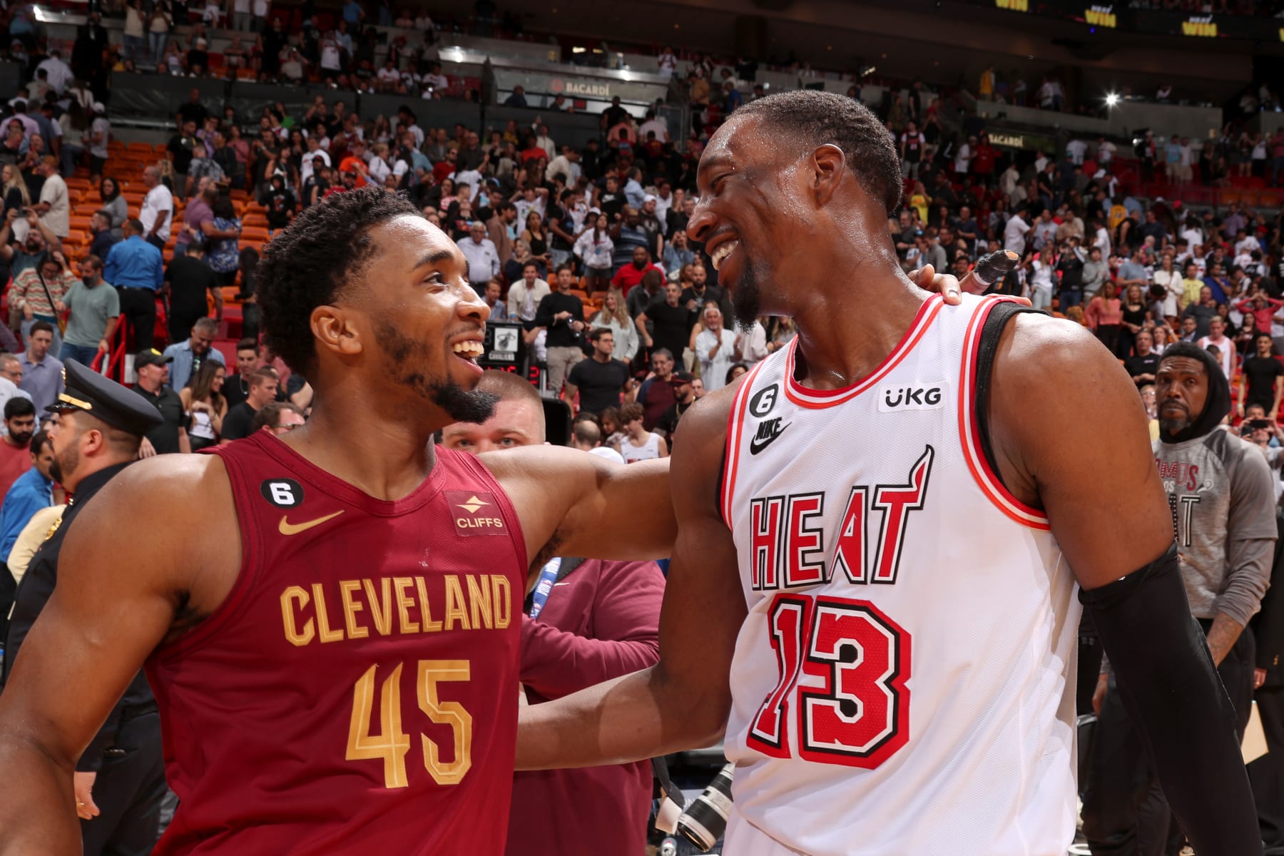 MIAMI, FL - MARCH 10: Donovan Mitchell #45 of the Cleveland Cavaliers talks with Bam Adebayo #13 of the Miami Heat after the game on March 10, 2023 at Miami-Dade Arena in Miami, Florida. NOTE TO USER: User expressly acknowledges and agrees that, by downloading and or using this Photograph, user is consenting to the terms and conditions of the Getty Images License Agreement. Mandatory Copyright Notice: Copyright 2023 NBAE (Photo by Issac Baldizon/NBAE via Getty Images)