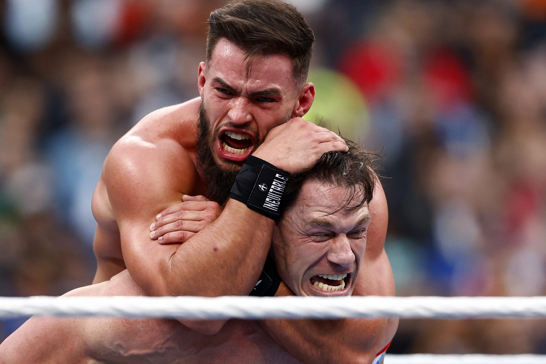INGLEWOOD, CALIFORNIA - APRIL 01:  (L-R) Austin Theory and John Cena wrestle for the United States Chamionship during WrestleMania Goes Hollywood at SoFi Stadium on April 01, 2023 in Inglewood, California. (Photo by Ronald Martinez/Getty Images)