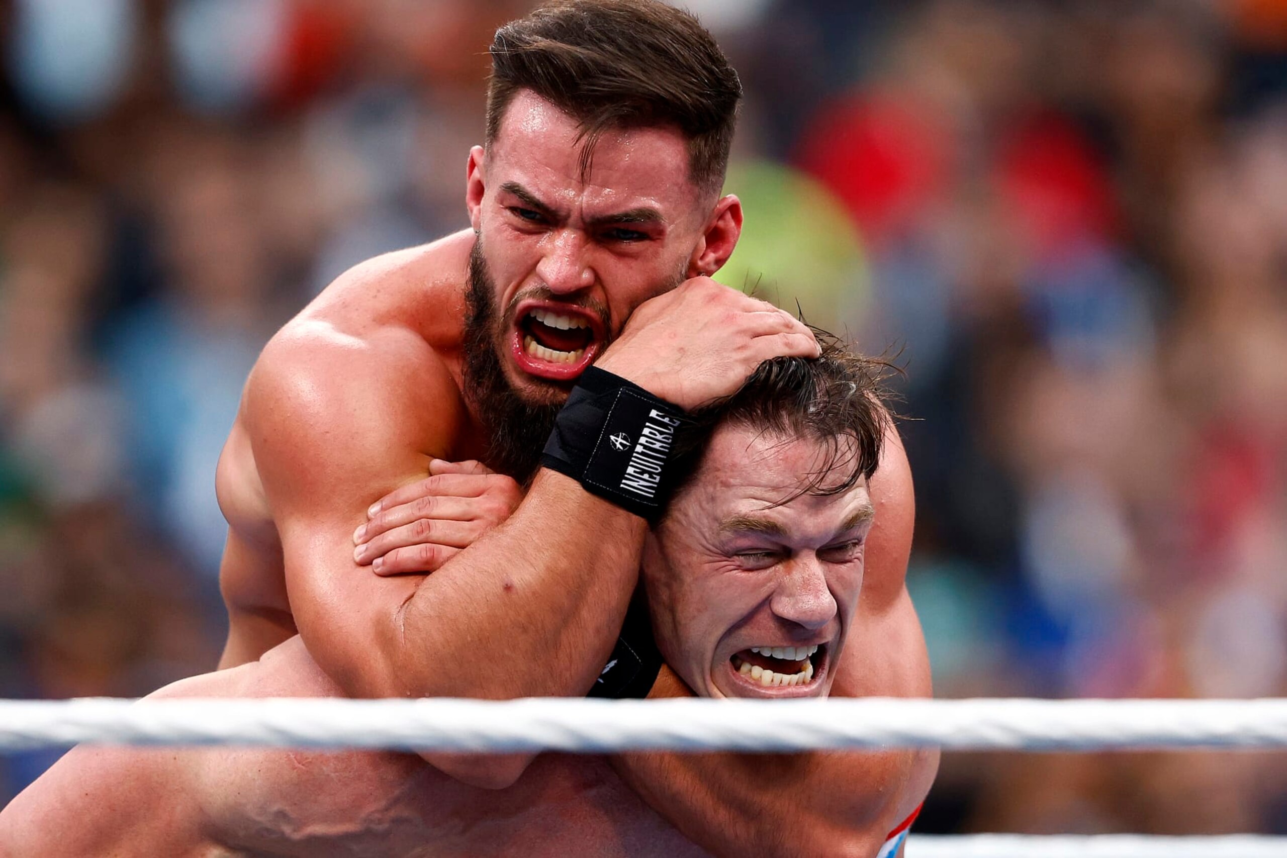 INGLEWOOD, CALIFORNIA - APRIL 01:  (L-R) Austin Theory and John Cena wrestle for the United States Chamionship during WrestleMania Goes Hollywood at SoFi Stadium on April 01, 2023 in Inglewood, California. (Photo by Ronald Martinez/Getty Images)