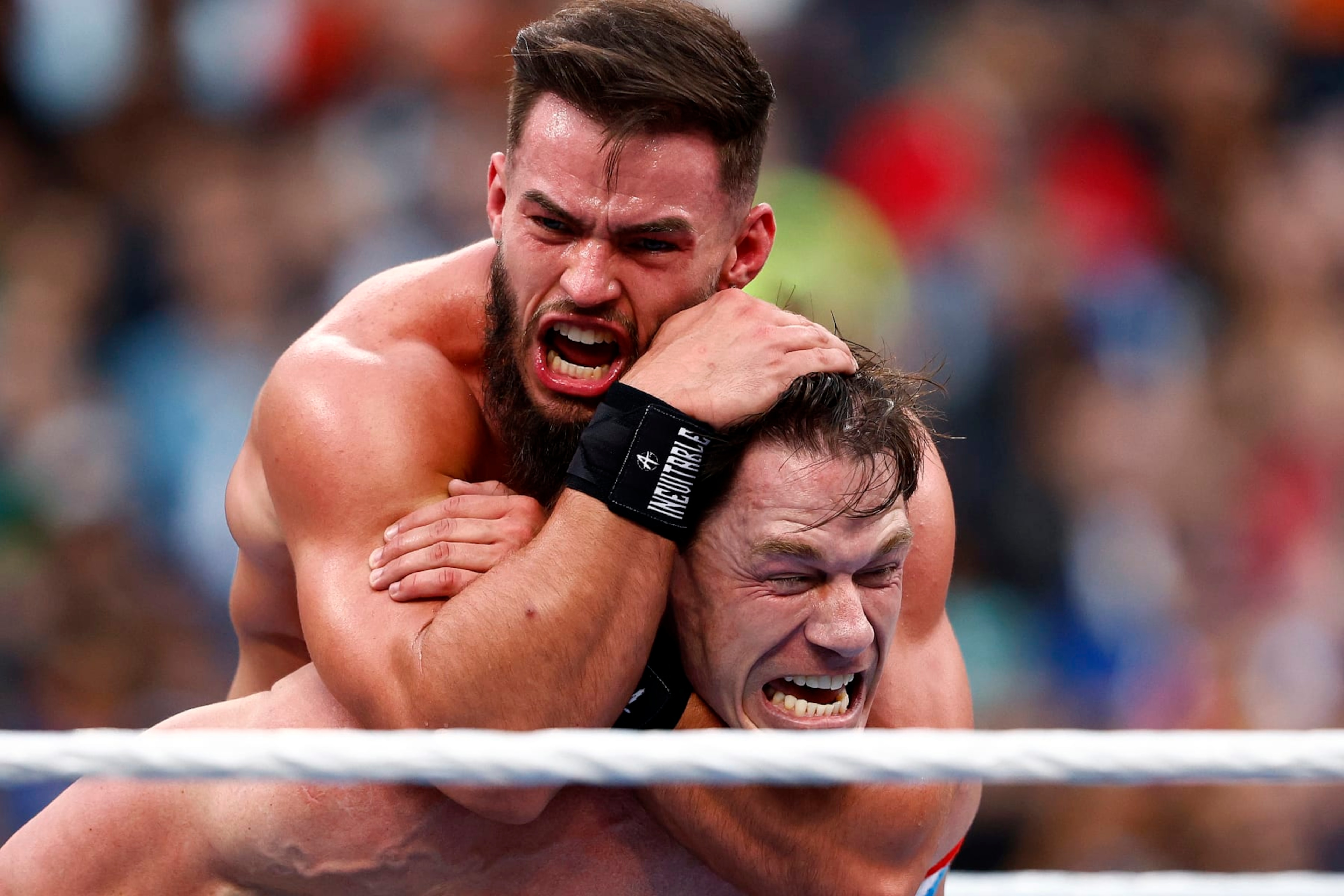 INGLEWOOD, CALIFORNIA - APRIL 01:  (L-R) Austin Theory and John Cena wrestle for the United States Chamionship during WrestleMania Goes Hollywood at SoFi Stadium on April 01, 2023 in Inglewood, California. (Photo by Ronald Martinez/Getty Images)