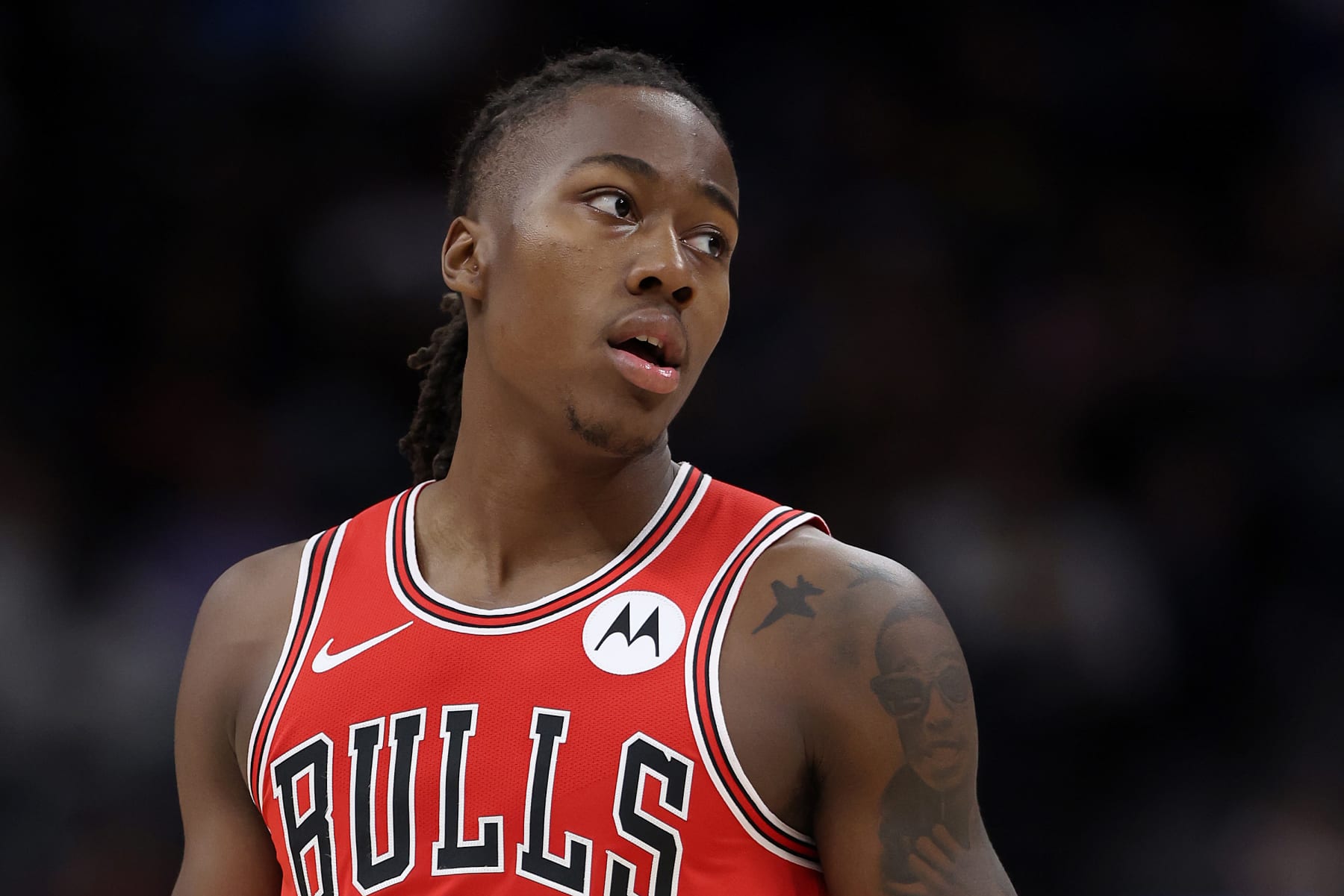 DENVER, COLORADO - OCTOBER 15: Ayo Dosunmu #12 of the Chicago Bulls plays the Denver Nuggets at Ball Arena on October 15, 2023 in Denver, Colorado. NOTE TO USER: User expressly acknowledges and agrees that, by downloading and or using this photograph, User is consenting to the terms and conditions of the Getty Images License Agreement. (Photo by Matthew Stockman/Getty Images)