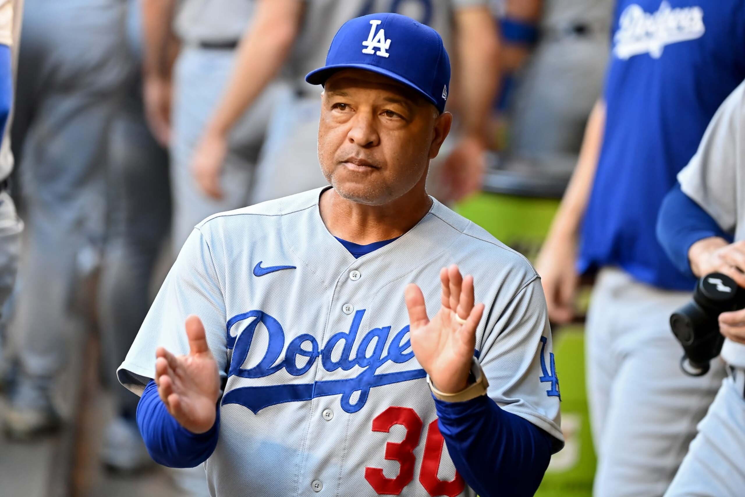 PHOENIX, ARIZONA - OCTOBER 11: Manager Dave Roberts of the Los Angeles Dodgers looks on before Game Three of the Division Series against the Arizona Diamondbacks at Chase Field on October 11, 2023 in Phoenix, Arizona. (Photo by Norm Hall/Getty Images)