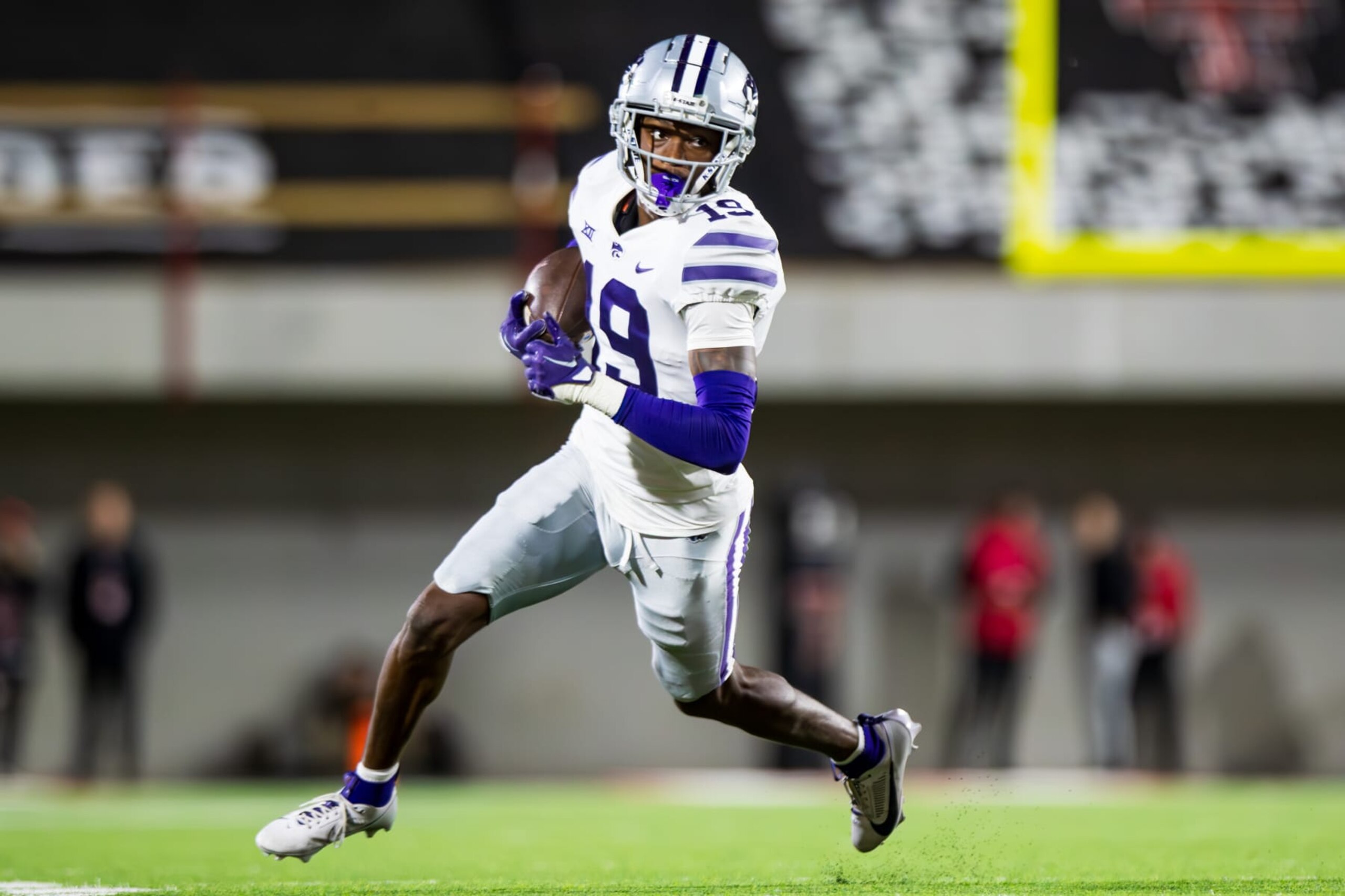 LUBBOCK, TEXAS - OCTOBER 14: VJ Payne #19 of the Kansas State Wildcats runs the ball after intercepting a pass during the second half of the game against the Texas Tech Red Raiders at Jones AT&T Stadium on October 14, 2023 in Lubbock, Texas. (Photo by John E. Moore III/Getty Images)