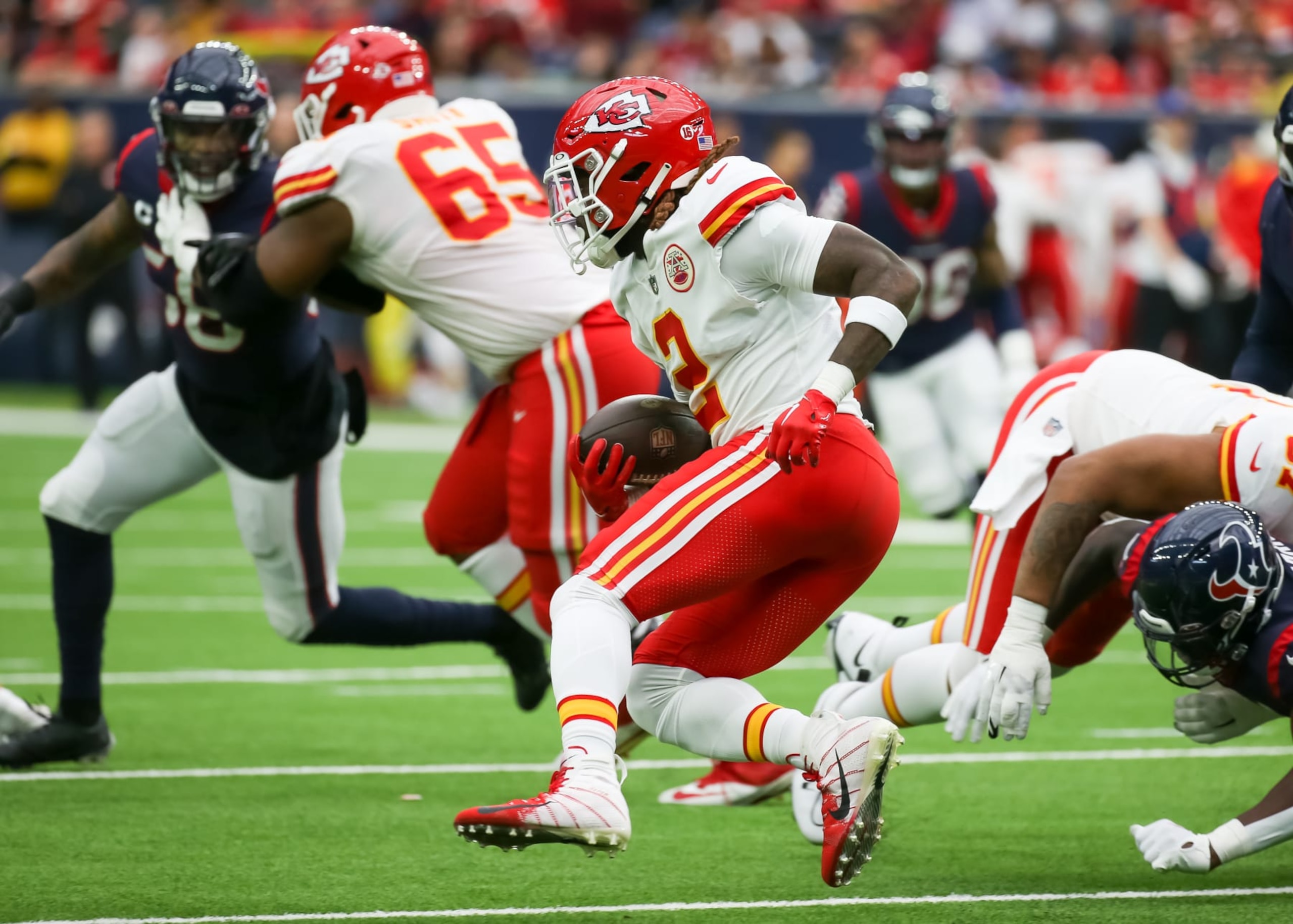 HOUSTON, TX - DECEMBER 18:  Kansas City Chiefs running back Ronald Jones (2) carries the ball in the second quarter during the NFL game between the Kansas City Chiefs and Houston Texans on December 18, 2022 at NRG Stadium in Houston, Texas.  (Photo by Leslie Plaza Johnson/Icon Sportswire via Getty Images)