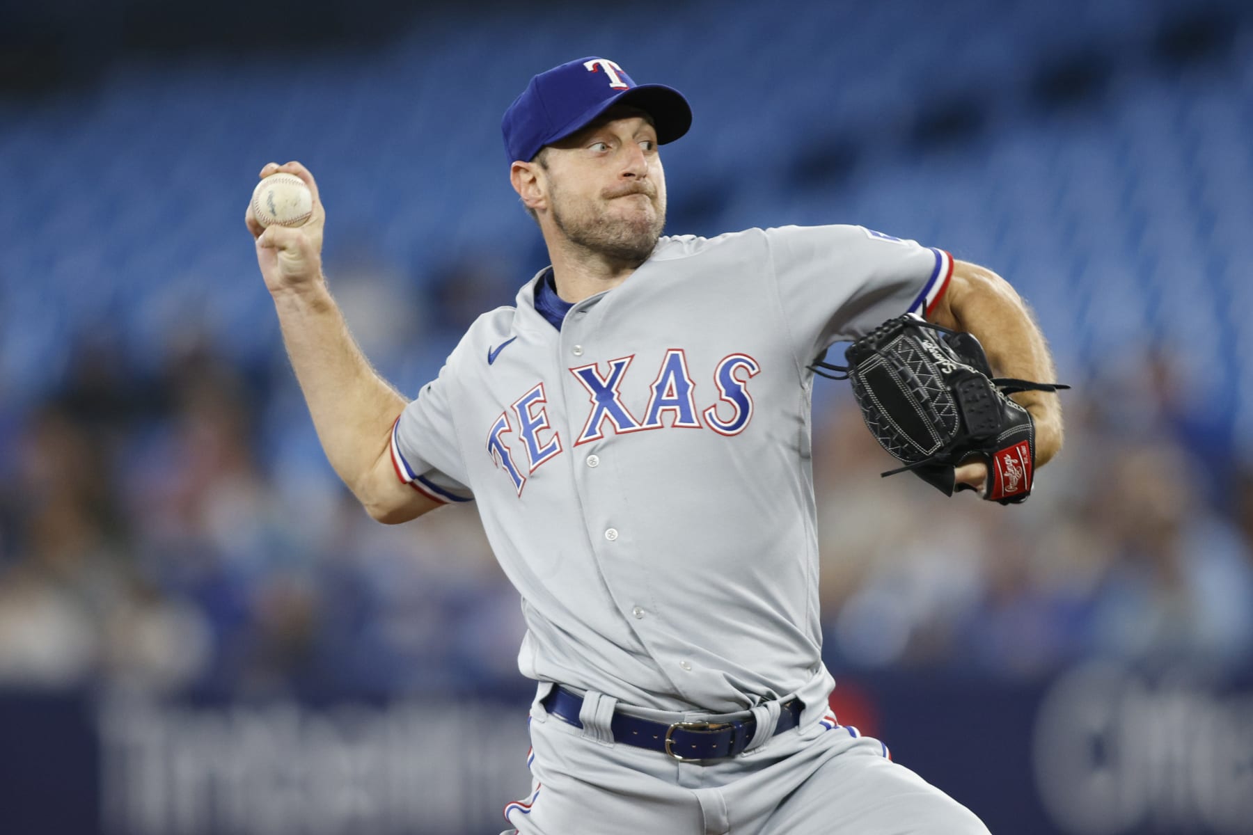 TORONTO, CANADA - SEPTEMBER 12: Max Scherzer #31 of the Texas Rangers pitches in the first inning of their MLB game against the Toronto Blue Jays at Rogers Centre on September 12, 2023 in Toronto, Canada. (Photo by Cole Burston/Getty Images)