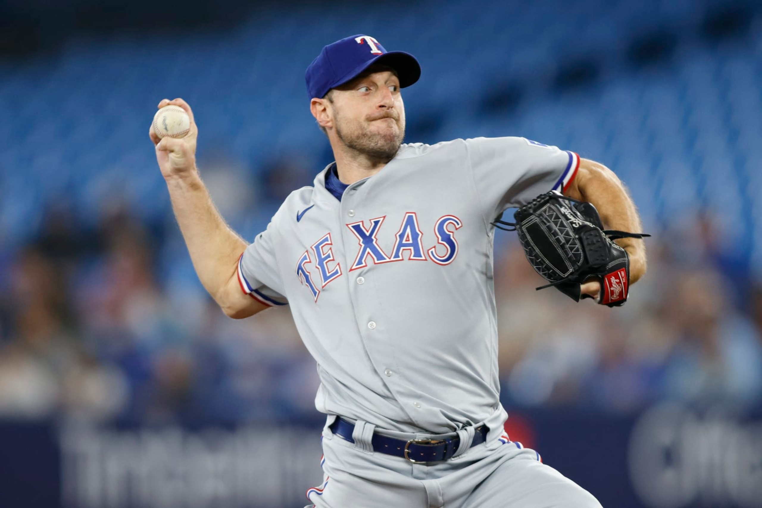 TORONTO, CANADA - SEPTEMBER 12: Max Scherzer #31 of the Texas Rangers pitches in the first inning of their MLB game against the Toronto Blue Jays at Rogers Centre on September 12, 2023 in Toronto, Canada. (Photo by Cole Burston/Getty Images)