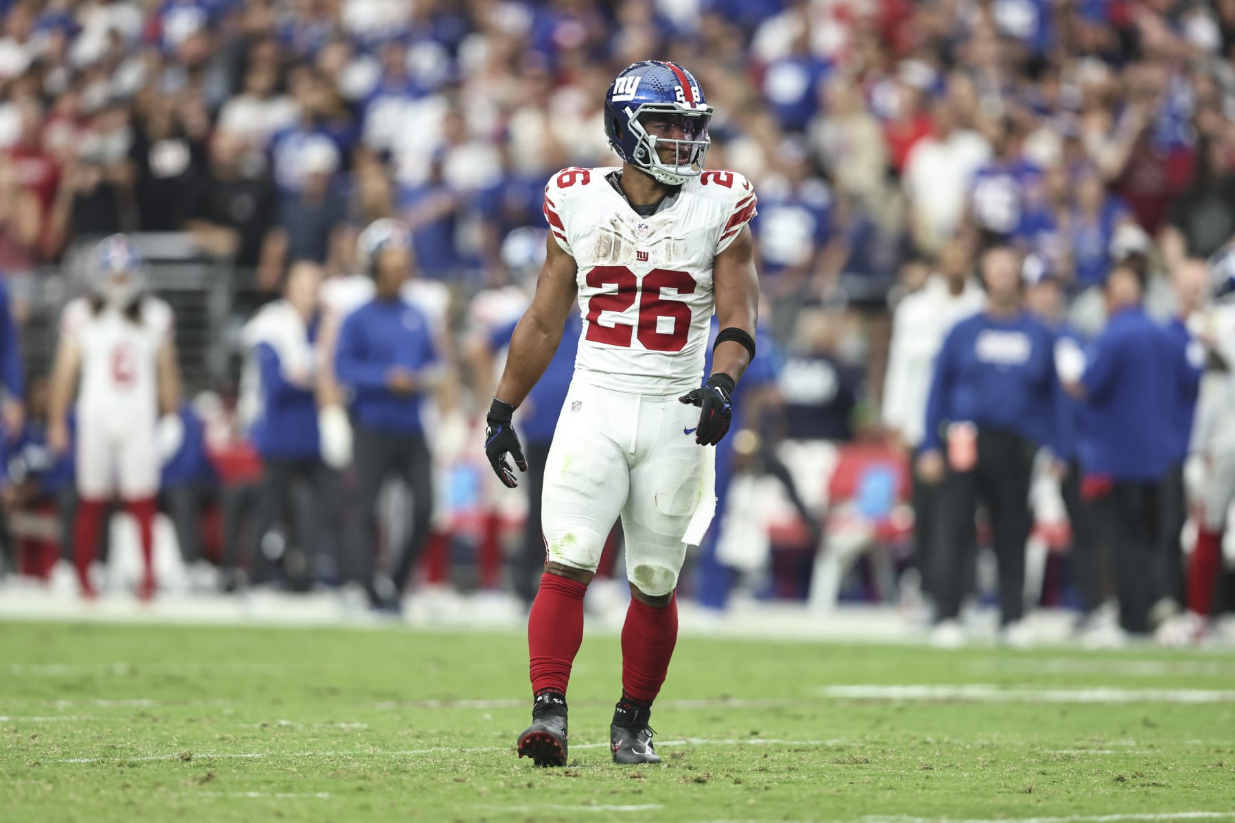 GLENDALE, ARIZONA - SEPTEMBER 17: Saquon Barkley #26 of the New York Giants liens up during an NFL football game between the Arizona Cardinals and the New York Giants at State Farm Stadium on September 17, 2023 in Glendale, Arizona. (Photo by Michael Owens/Getty Images)