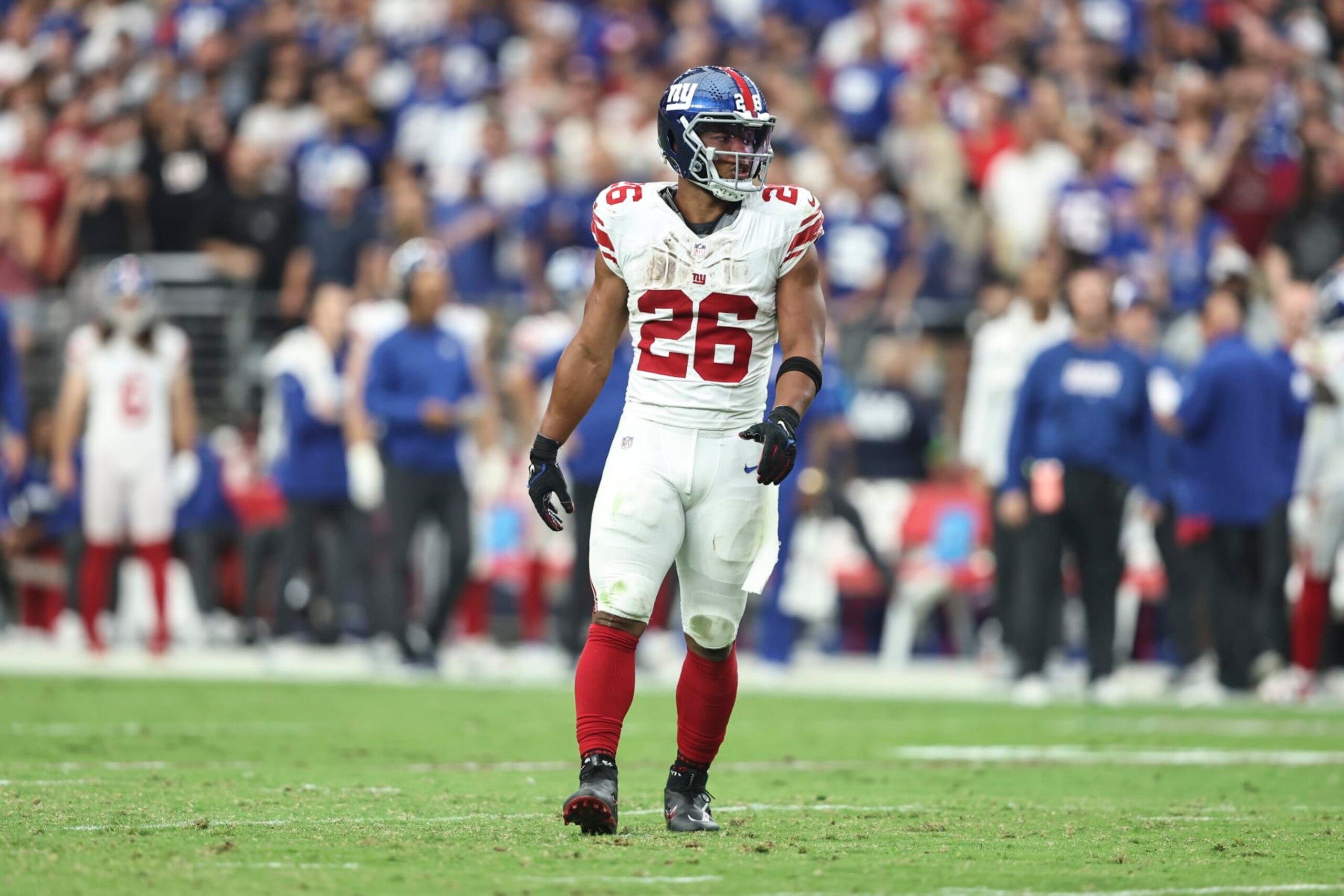 GLENDALE, ARIZONA - SEPTEMBER 17: Saquon Barkley #26 of the New York Giants liens up during an NFL football game between the Arizona Cardinals and the New York Giants at State Farm Stadium on September 17, 2023 in Glendale, Arizona. (Photo by Michael Owens/Getty Images)