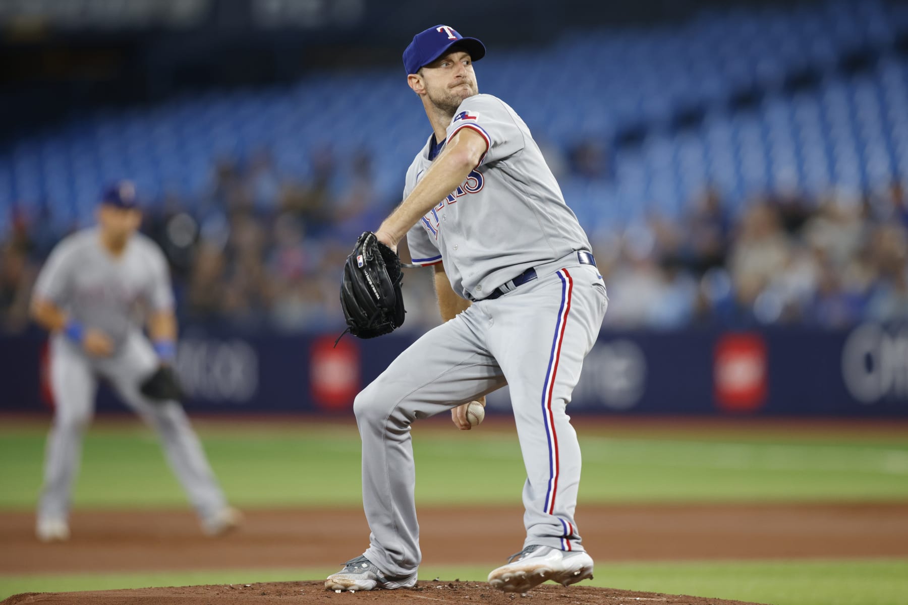 TORONTO, CANADA - SEPTEMBER 12: Max Scherzer #31 of the Texas Rangers pitches in the first inning against the Toronto Blue Jays at Rogers Centre on September 12, 2023 in Toronto, Canada. (Photo by Cole Burston/Getty Images) TORONTO, CANADA - SEPTEMBER 12: Max Scherzer #31 of the Texas Rangers pitches in the first inning against the Toronto Blue Jays at Rogers Centre on September 12, 2023 in Toronto, Canada. (Photo by Cole Burston/Getty Images)